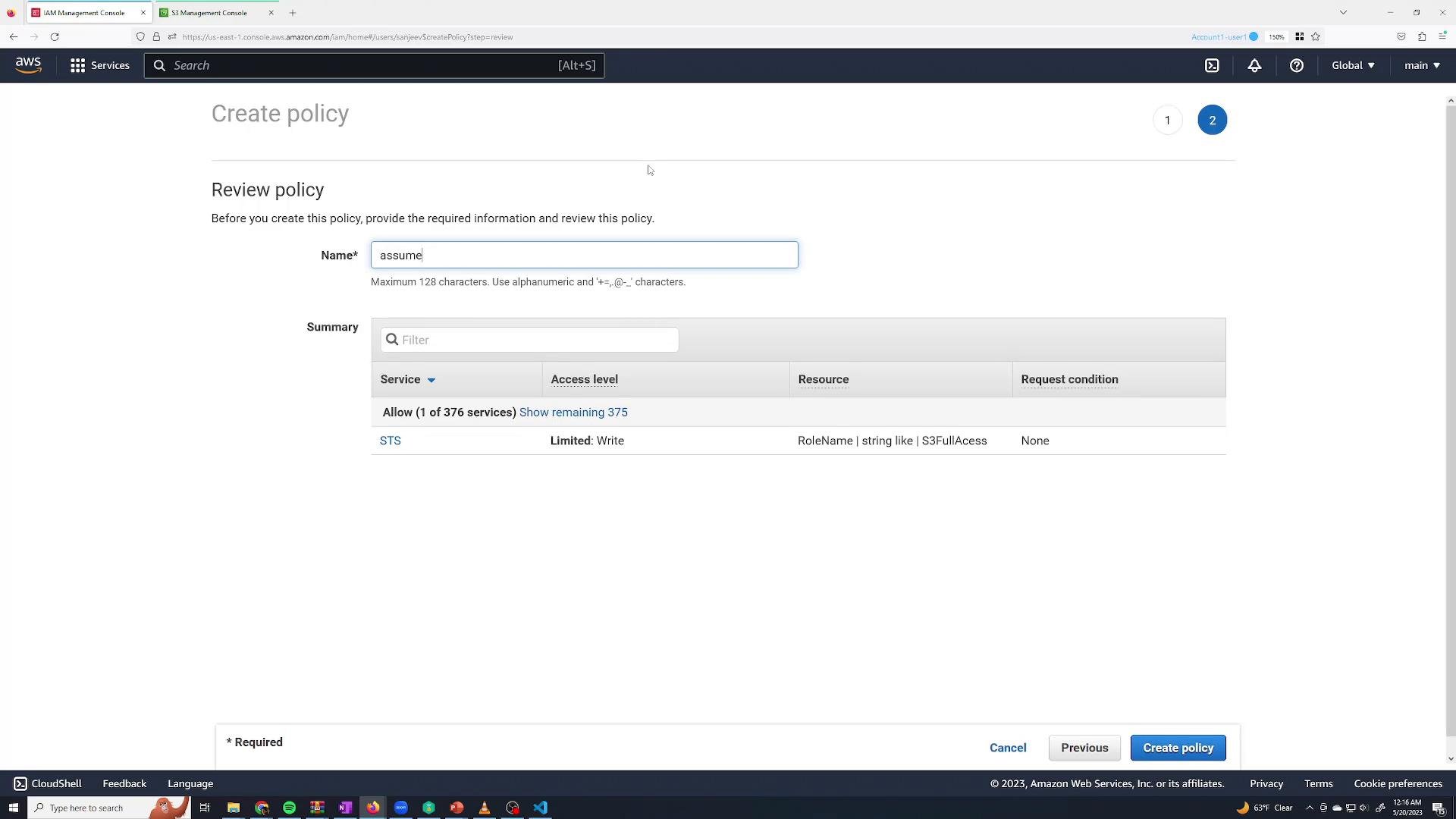 A screenshot of the AWS IAM "Create policy" review page where a policy name ("assume") is being entered and the summary shows an STS Allow (Limited: Write) permission for a role named like "S3FullAccess." The bottom right has navigation buttons including "Create policy."