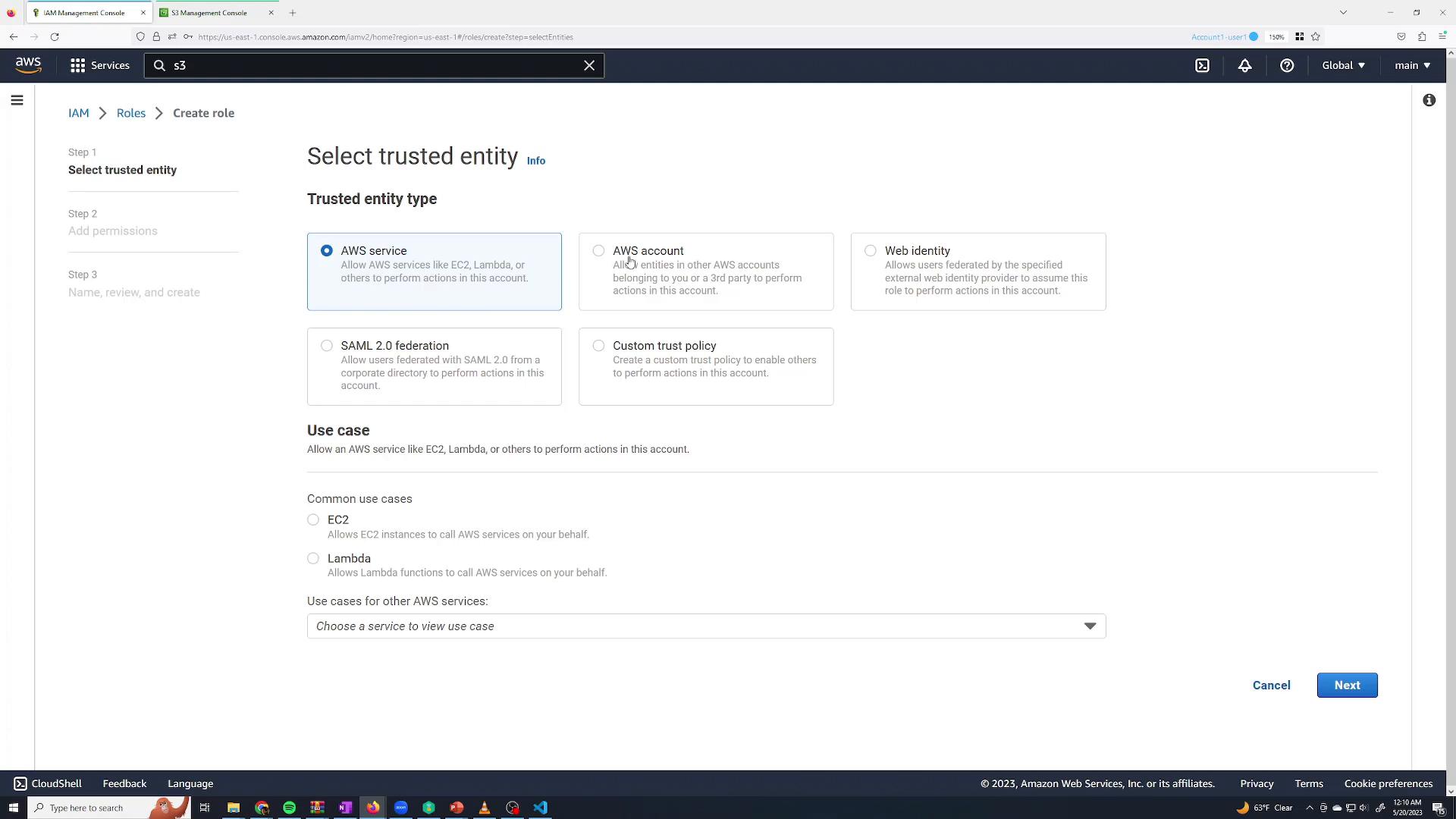 A screenshot of the AWS IAM Management Console on the "Create role" > "Select trusted entity" page. The "AWS service" option is selected and common use cases like EC2 and Lambda are shown, with Cancel and Next buttons at the bottom.