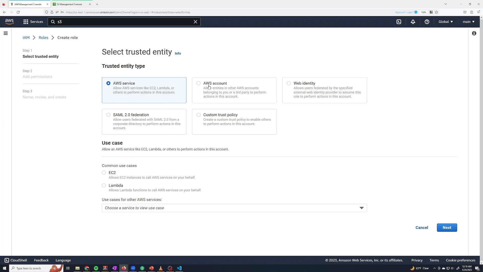 A screenshot of the AWS IAM Management Console on the "Create role" > "Select trusted entity" page. The "AWS service" option is selected and common use cases like EC2 and Lambda are shown, with Cancel and Next buttons at the bottom.