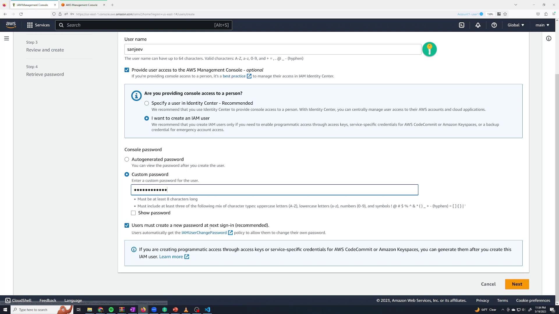 A screenshot of the AWS Management Console IAM "Create user" page showing the username "sanjeev" with console access enabled and a custom password entered. The form displays password options, a checkbox requiring the user to reset the password at next sign-in, and a highlighted Next button.