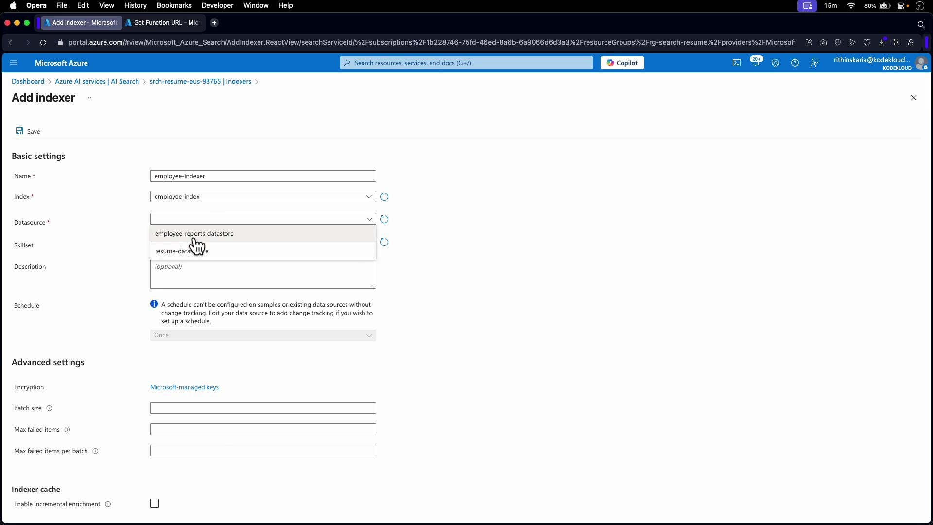 A screenshot of the Microsoft Azure portal showing the "Add indexer" page with fields for Name, Index, Datasource (dropdown open), Skillset, Description and scheduling. The lower section shows advanced settings like encryption, batch size and indexer cache options.