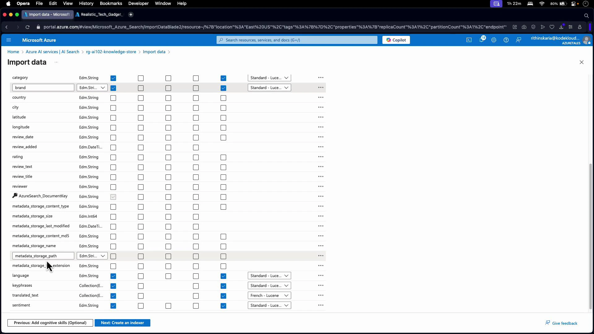 A browser screenshot of the Microsoft Azure portal showing an "Import data" field-mapping table for an AI Search/knowledge store, listing columns like brand, country, city, latitude, review_text and metadata with data types and checkbox/indexing options. The page includes navigation buttons at the bottom to add cognitive skills or create an indexer.