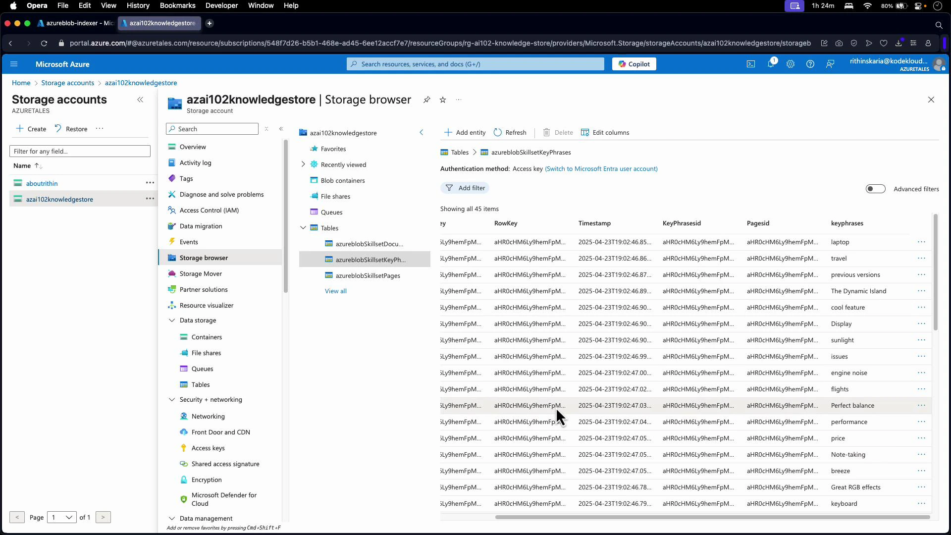 Screenshot of the Microsoft Azure portal open to a Storage accounts > Storage browser view. The right pane shows a table of storage entities (azureblobSkillsetKeyPhrases) with columns like RowKey, Timestamp, Pagesid and keyphrases.