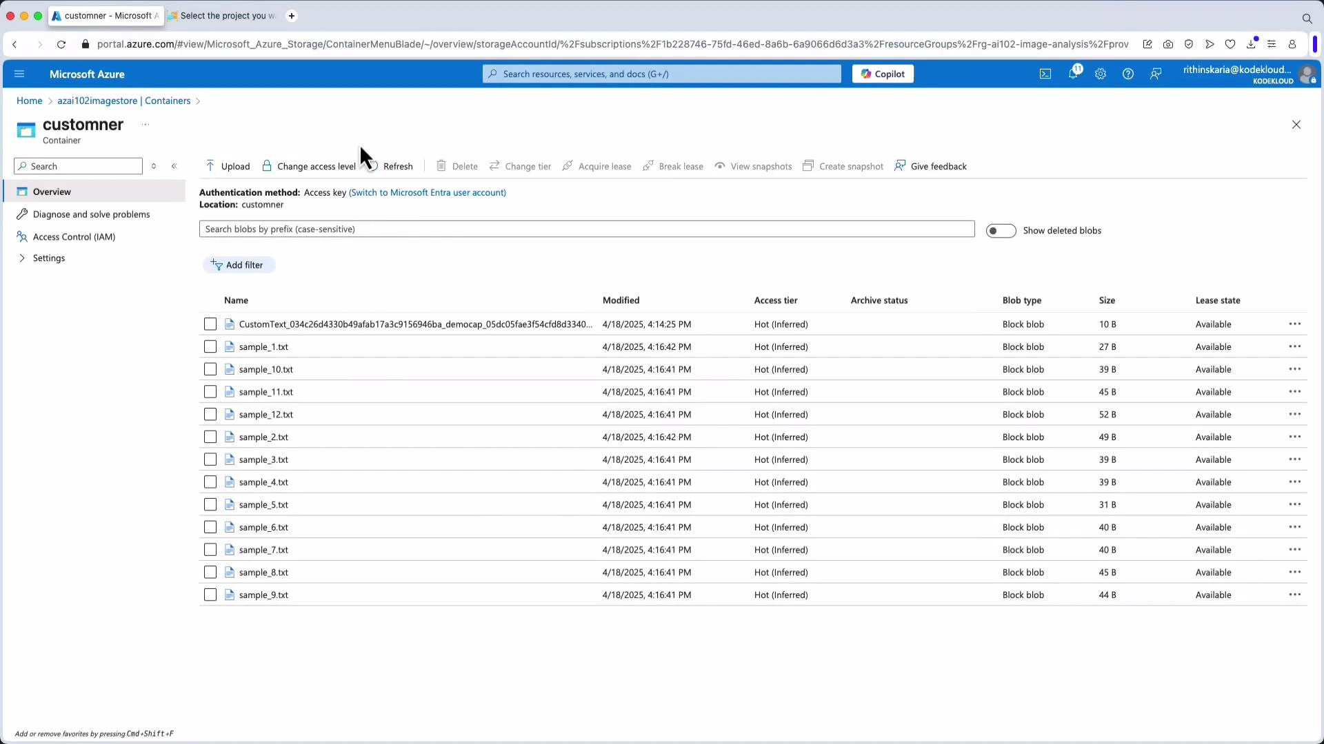A screenshot of the Microsoft Azure portal showing a storage container called "customner" with a list of blob files (e.g., sample_1.txt, sample_2.txt, etc.) and one CustomText file. The table shows each blob's modified timestamp, access tier (Hot), blob type (Block blob), size and lease state.