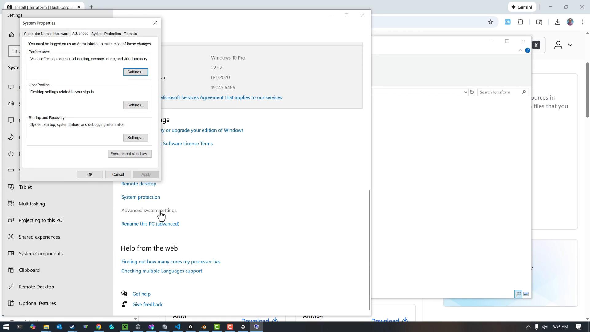 A screenshot of a Windows 10 desktop showing the System Properties "Advanced" dialog open (Performance, User Profiles, Startup and Recovery) with an "Environment Variables" button. In the background the Settings window and Windows 10 Pro system info are visible.
