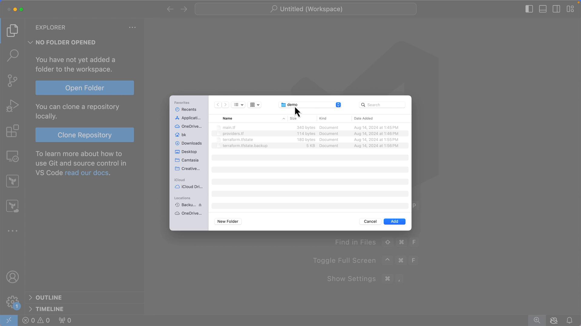 A screenshot of Visual Studio Code with a macOS folder picker open, focused on a "demo" folder. The folder contains Terraform-related files (main.tf, providers.tf, terraform.tfstate and terraform.tfstate.backup).