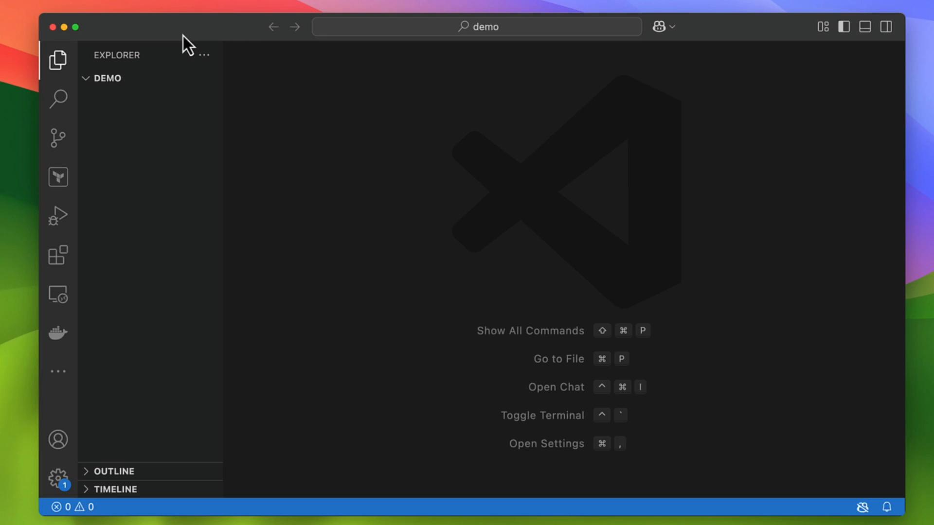 A dark-themed Visual Studio Code window showing the Explorer sidebar with a "DEMO" folder and an empty editor area featuring a large VS Code logo and command shortcut hints. The window sits on a colorful macOS desktop background.
