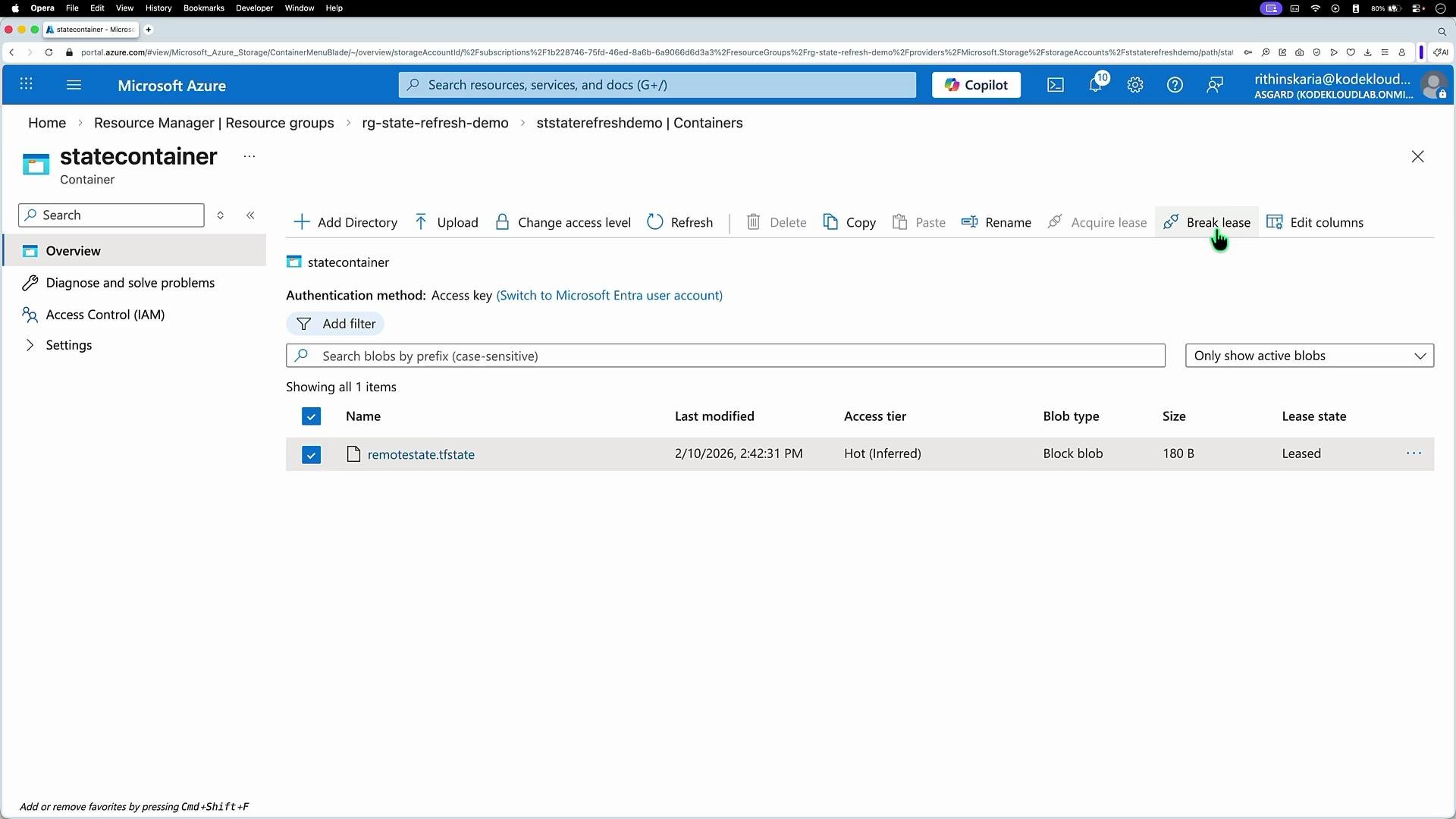 The image shows a Microsoft Azure portal interface displaying a container named "statecontainer" with a blob file "remotestate.tfstate" that is "Leased" and has an access tier set to "Hot (Inferred)."