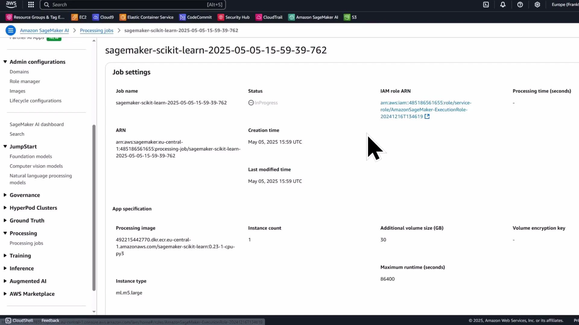 A screenshot of the Amazon SageMaker console showing details for a processing job named "sagemaker-scikit-learn-2025-05-05...". The page displays job settings including status (InProgress), ARN, IAM role, instance type (ml.m5.large) and other configuration fields.