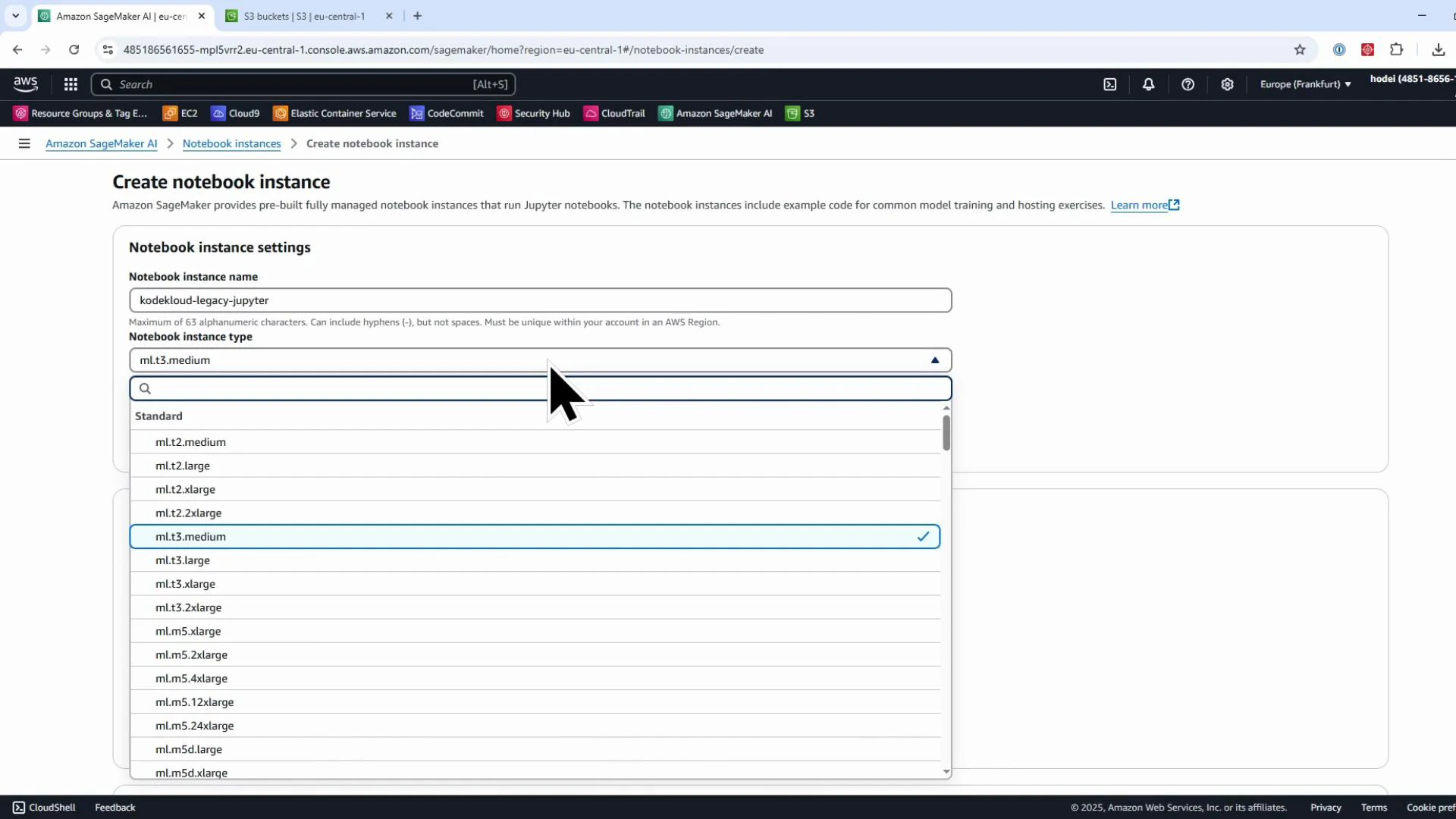 A screenshot of the Amazon SageMaker "Create notebook instance" page showing the Notebook instance settings with the instance type dropdown open and "ml.t3.medium" selected. The Notebook instance name field contains "kodekloud-legacy-jupyter."