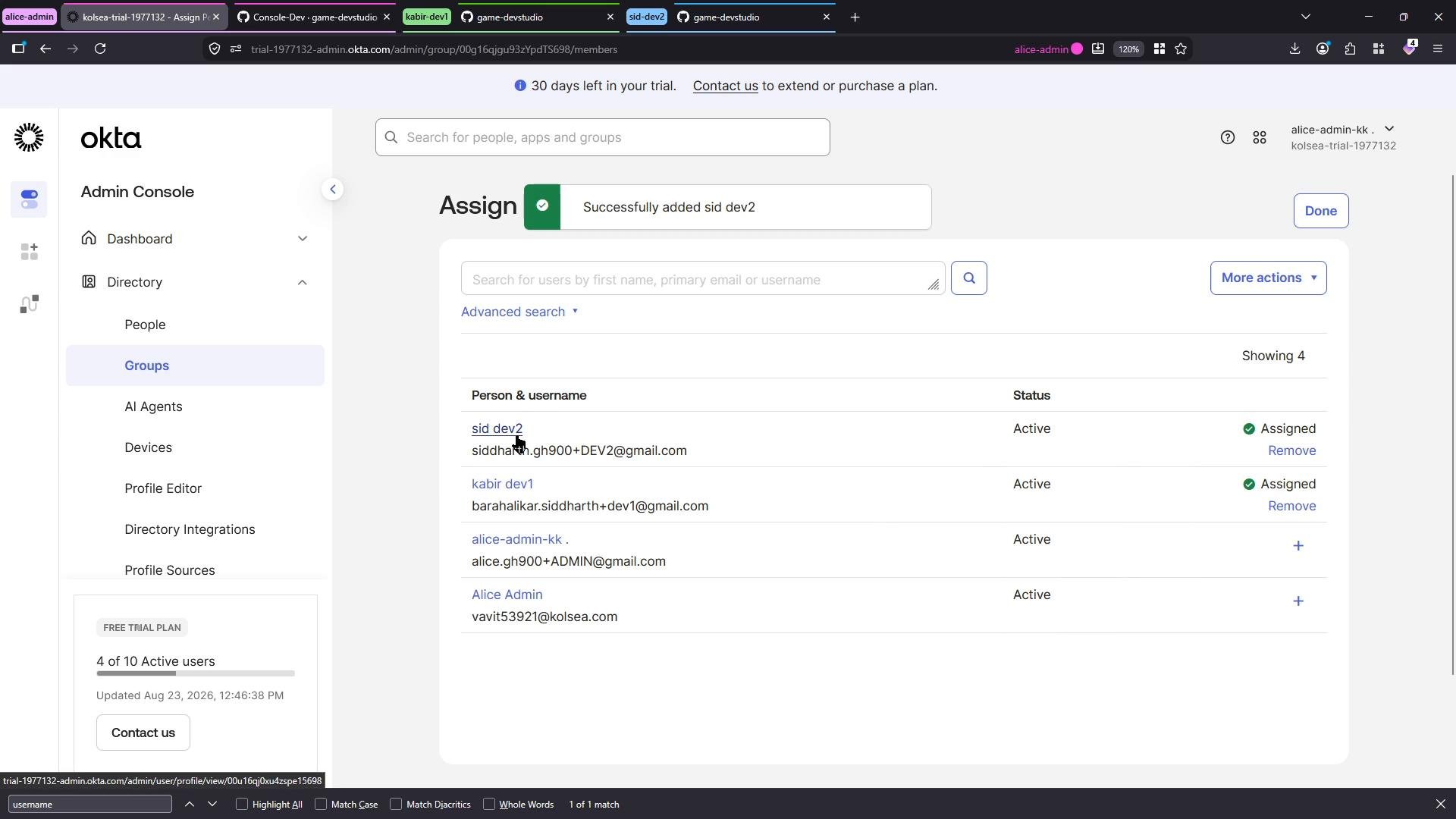 A screenshot of the Okta Admin Console on the Groups > Assign page showing a green "Successfully added sid dev2" confirmation and a list of users with their assignment statuses. The left sidebar shows navigation items like Dashboard, Directory, and Groups.