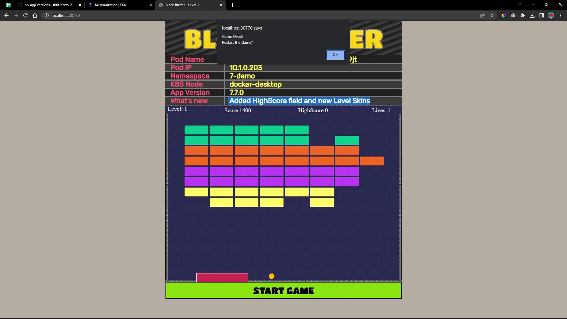 A browser screenshot of a block-breaker arcade game showing rows of multicolored bricks, a paddle and ball at the bottom, plus score and level indicators. A small "Game Over" alert popup is visible near the top.