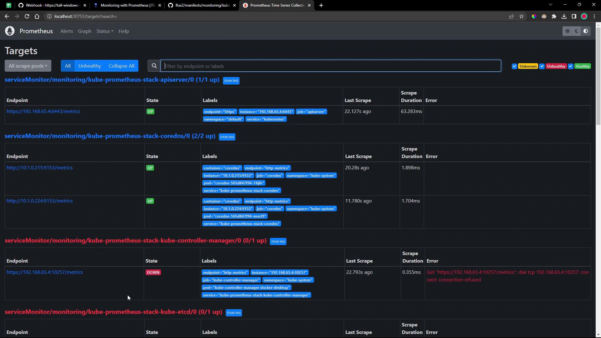 A screenshot of the Prometheus "Targets" page showing multiple serviceMonitors and their endpoints with labels, last scrape times, scrape durations and status indicators. One entry shows a red "DOWN" error for a kube-controller-manager endpoint while others are marked "UP."