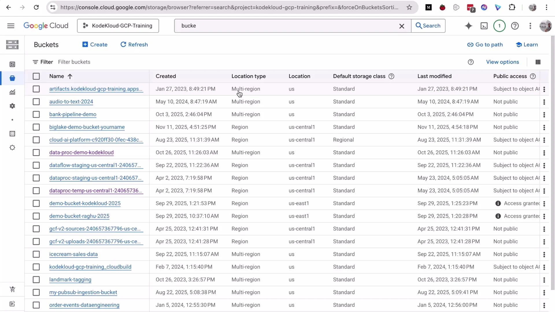 A screenshot of the Google Cloud Console showing the Storage → Buckets page with a table of bucket names, creation dates, location types/regions, storage classes, last modified timestamps, and public access settings. It lists buckets like "audio-to-text-2024" and "data-proc-demo-kodekloud" with various region/multi-region settings.