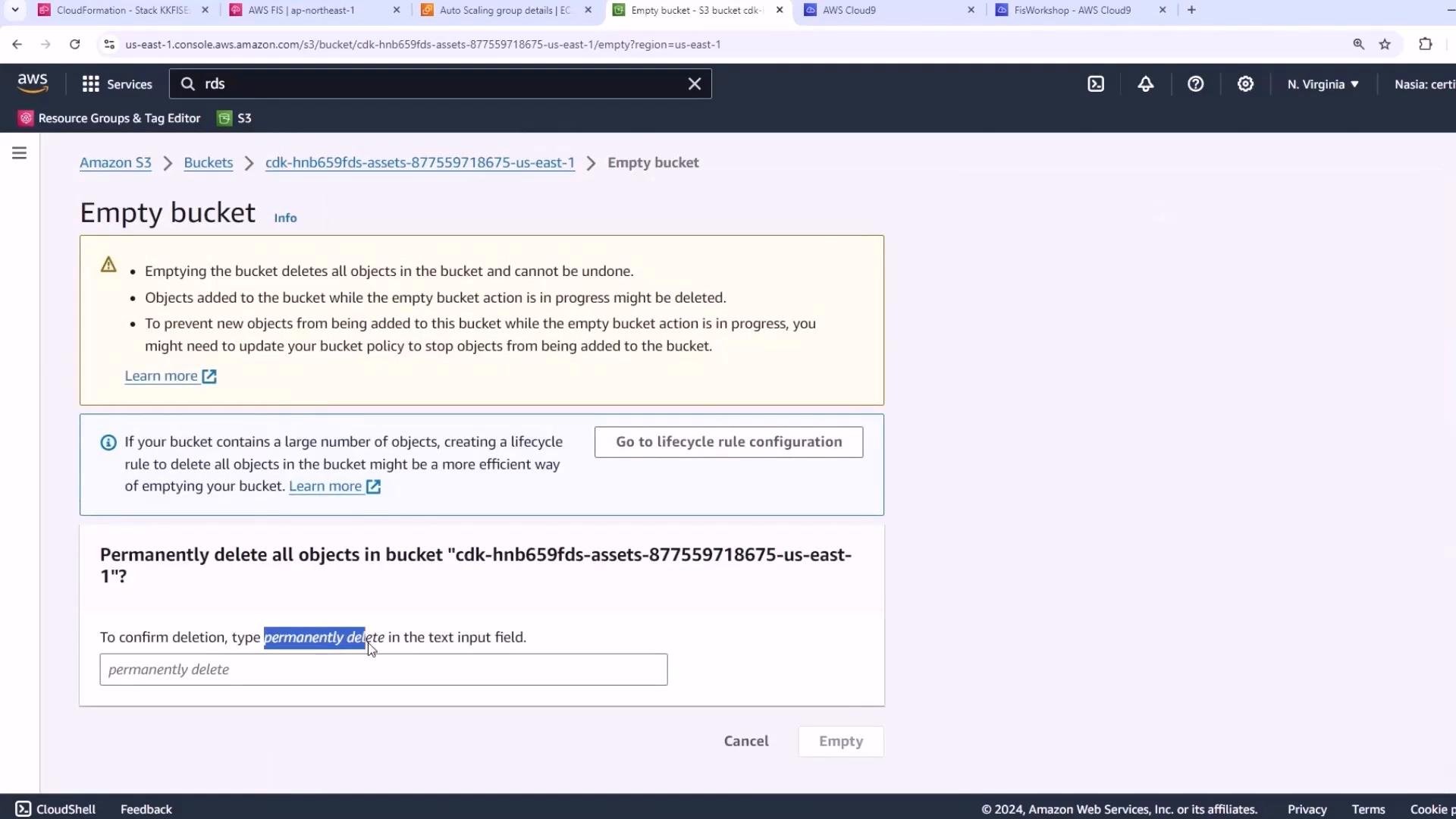 A screenshot of the AWS S3 console showing an "Empty bucket" confirmation page with warnings about permanently deleting objects. It includes a text field requiring you to type "permanently delete" and buttons to Cancel or Empty the bucket.