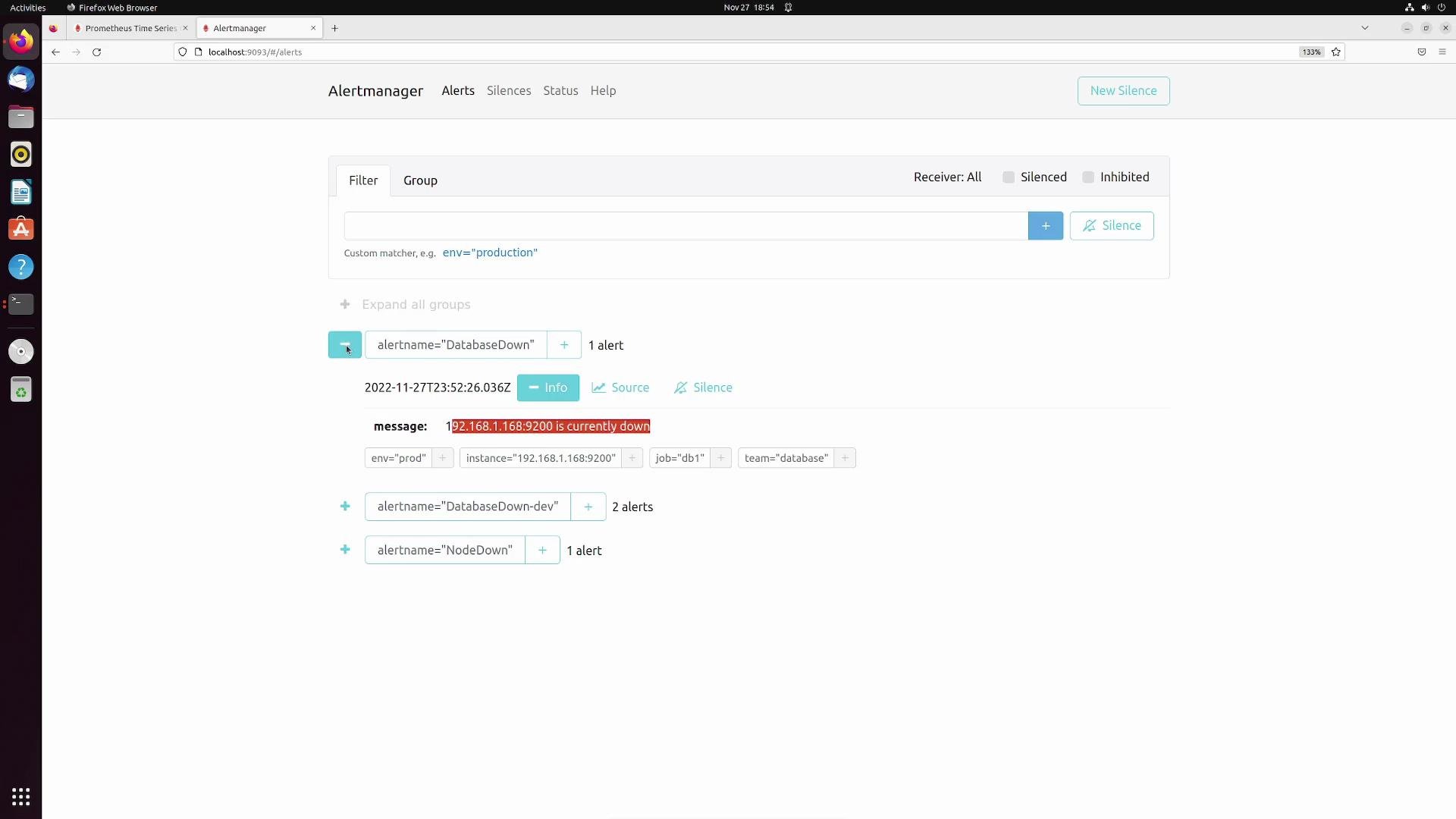 The image shows a web interface of Prometheus Alertmanager running in Firefox on a Linux system, displaying alerts for a database being down.
