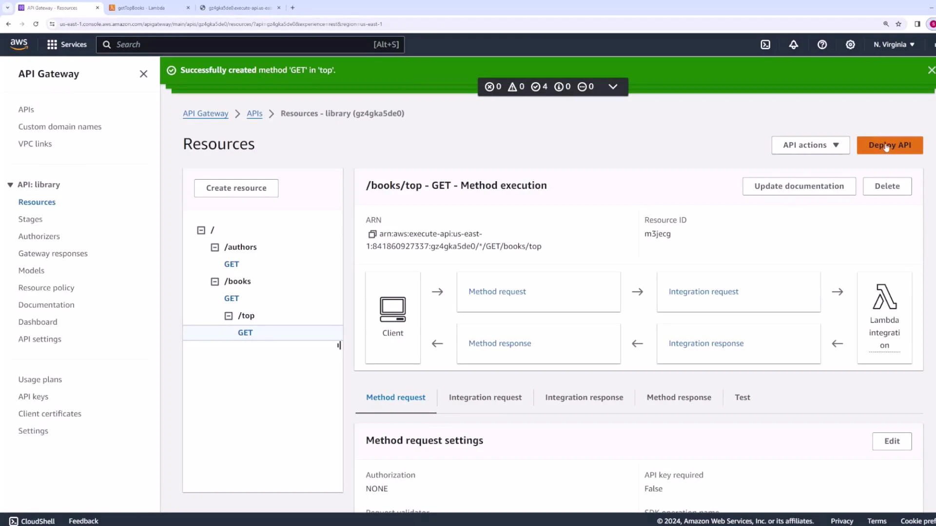 A screenshot of the AWS API Gateway console showing the "Resources" page for an API named "library," with a /books/top GET method configured and integrated with a Lambda function. The left panel lists resources like /authors and /books, while the main pane shows the method execution flow, ARN, and deployment options.