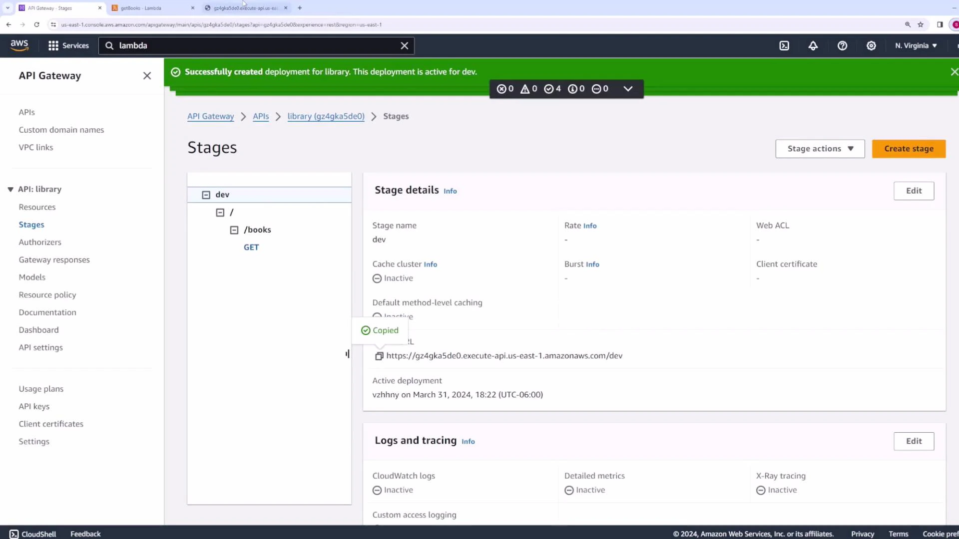 Screenshot of the AWS API Gateway console showing the "Stages" page for an API named "library." It shows a "dev" stage with a /books GET resource and the stage invoke URL.