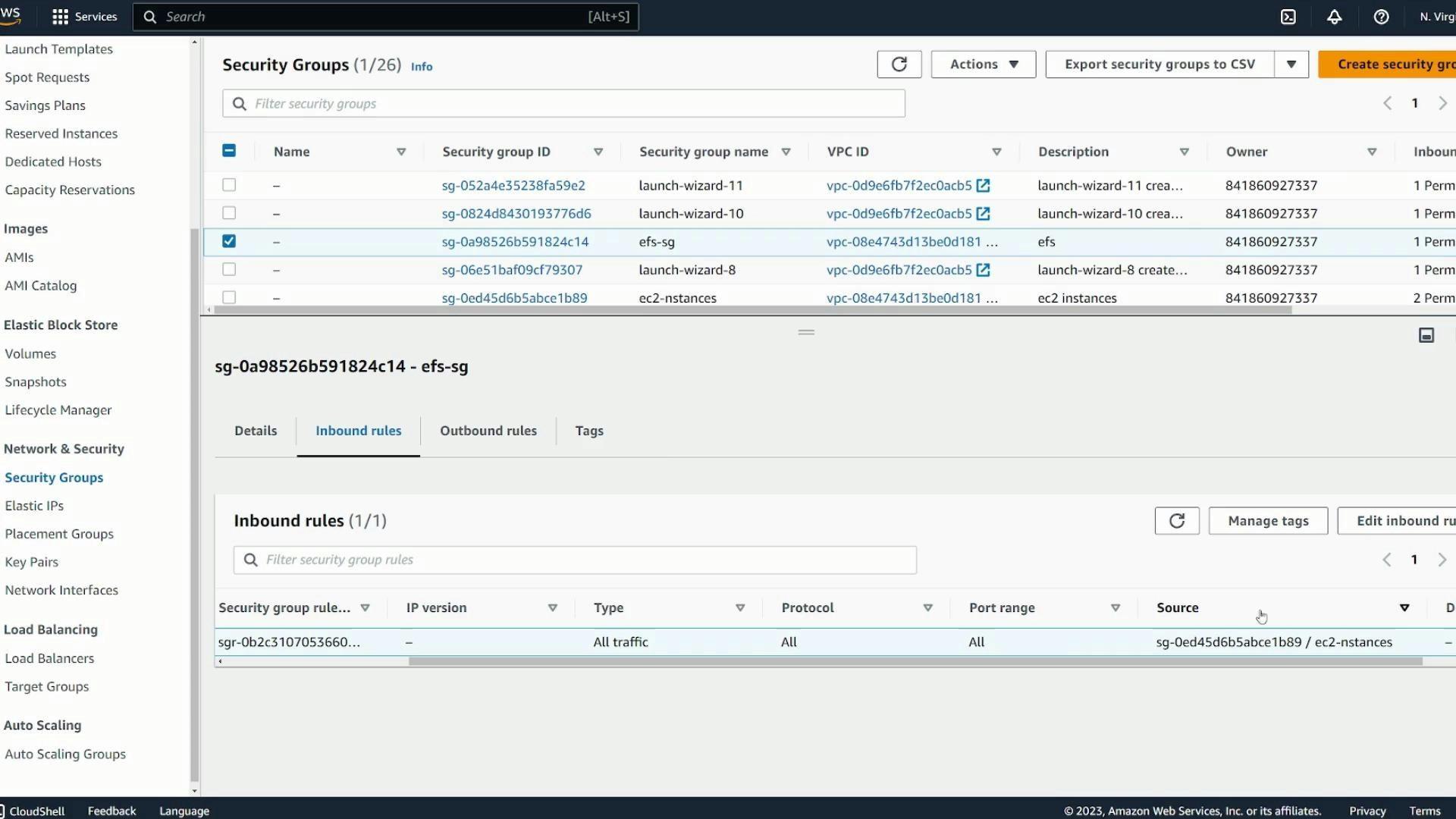 Screenshot of the AWS EC2 Security Groups console showing a selected security group named "efs-sg." The group (sg-0a985...) has one inbound rule allowing all traffic from another security group (ec2-instances).