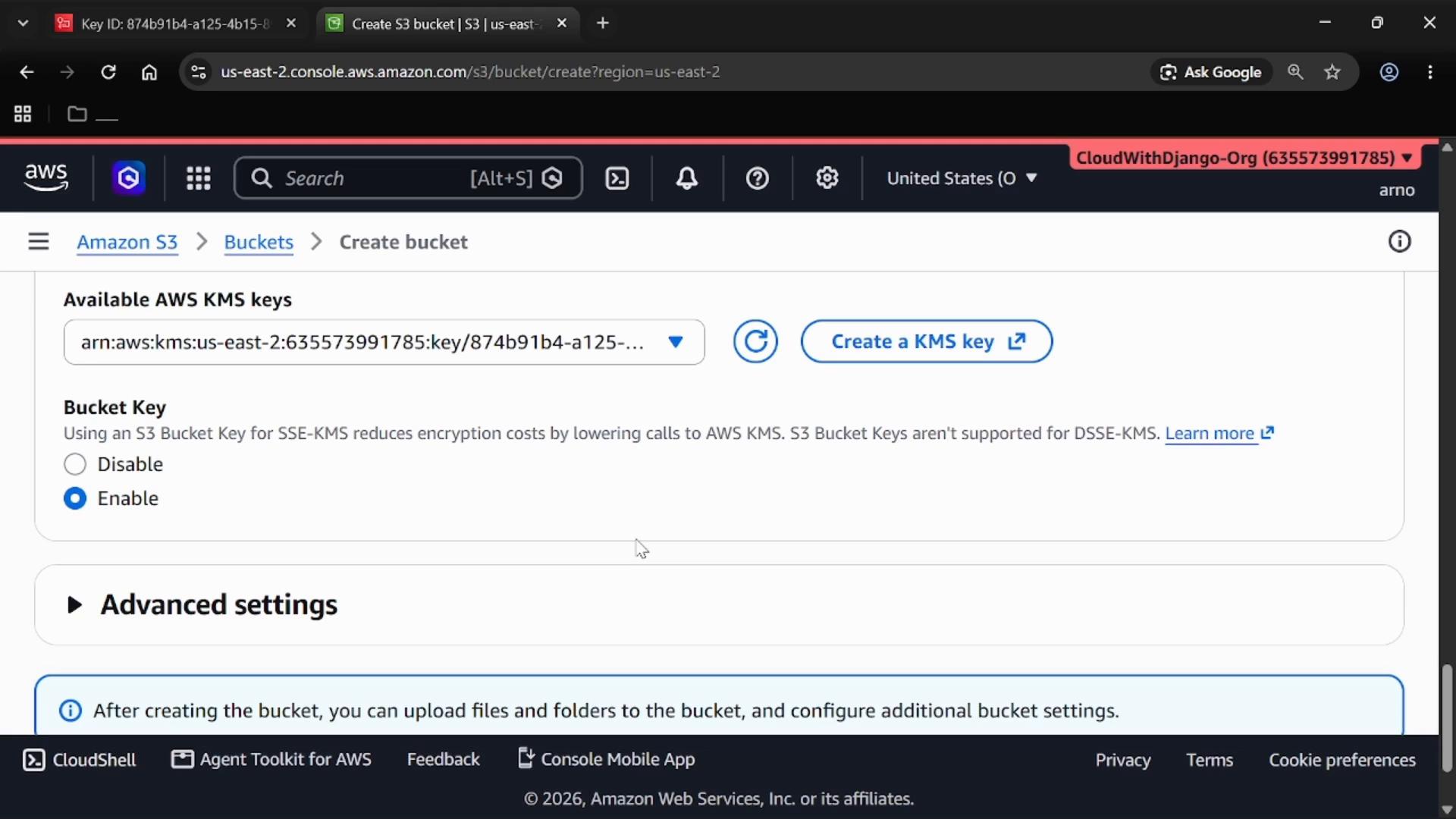 A screenshot of the AWS S3 "Create bucket" console showing an ARN-selected AWS KMS key and the S3 Bucket Key option set to "Enable." The page also shows the "Advanced settings" section collapsed.