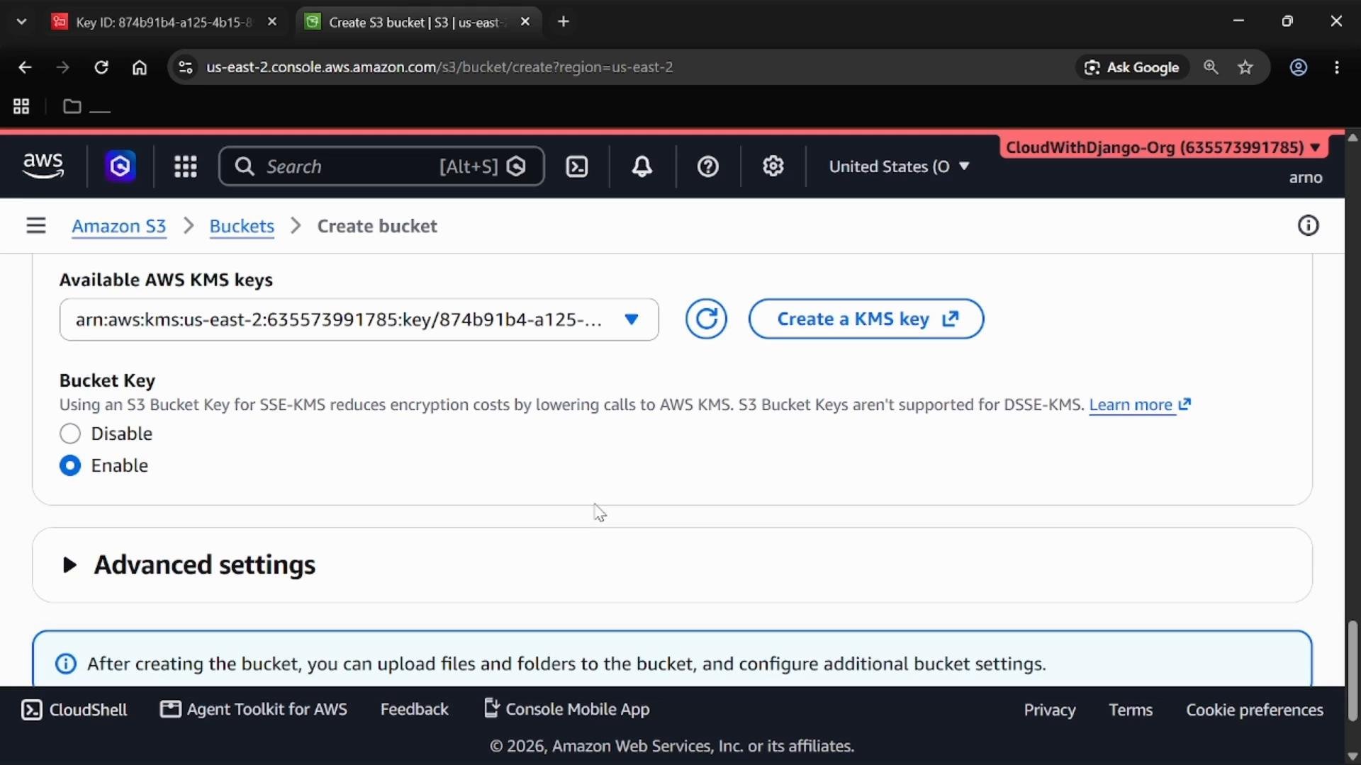 A screenshot of the AWS S3 "Create bucket" console showing an ARN-selected AWS KMS key and the S3 Bucket Key option set to "Enable." The page also shows the "Advanced settings" section collapsed.