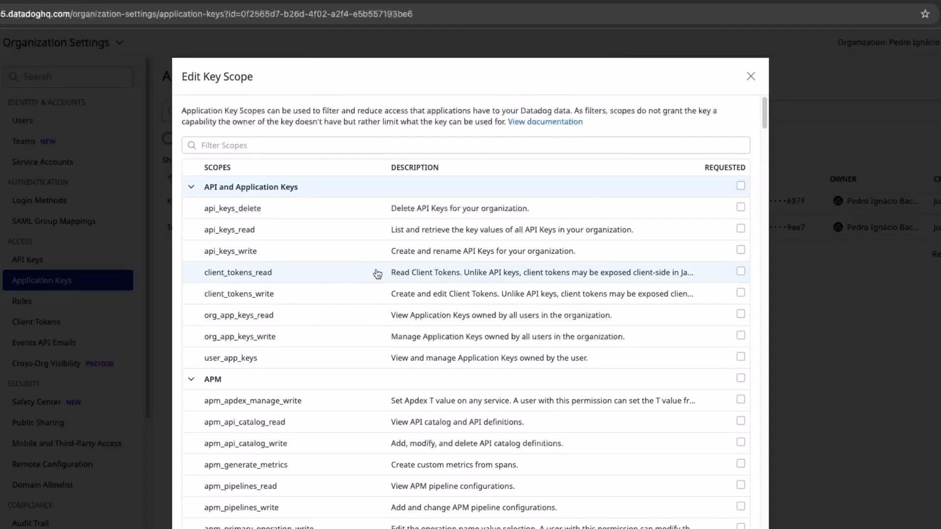 The image shows a software interface with a pop-up window titled "Edit Key Scope," listing various permissions related to API and application keys. This interface is part of an organization settings configuration.