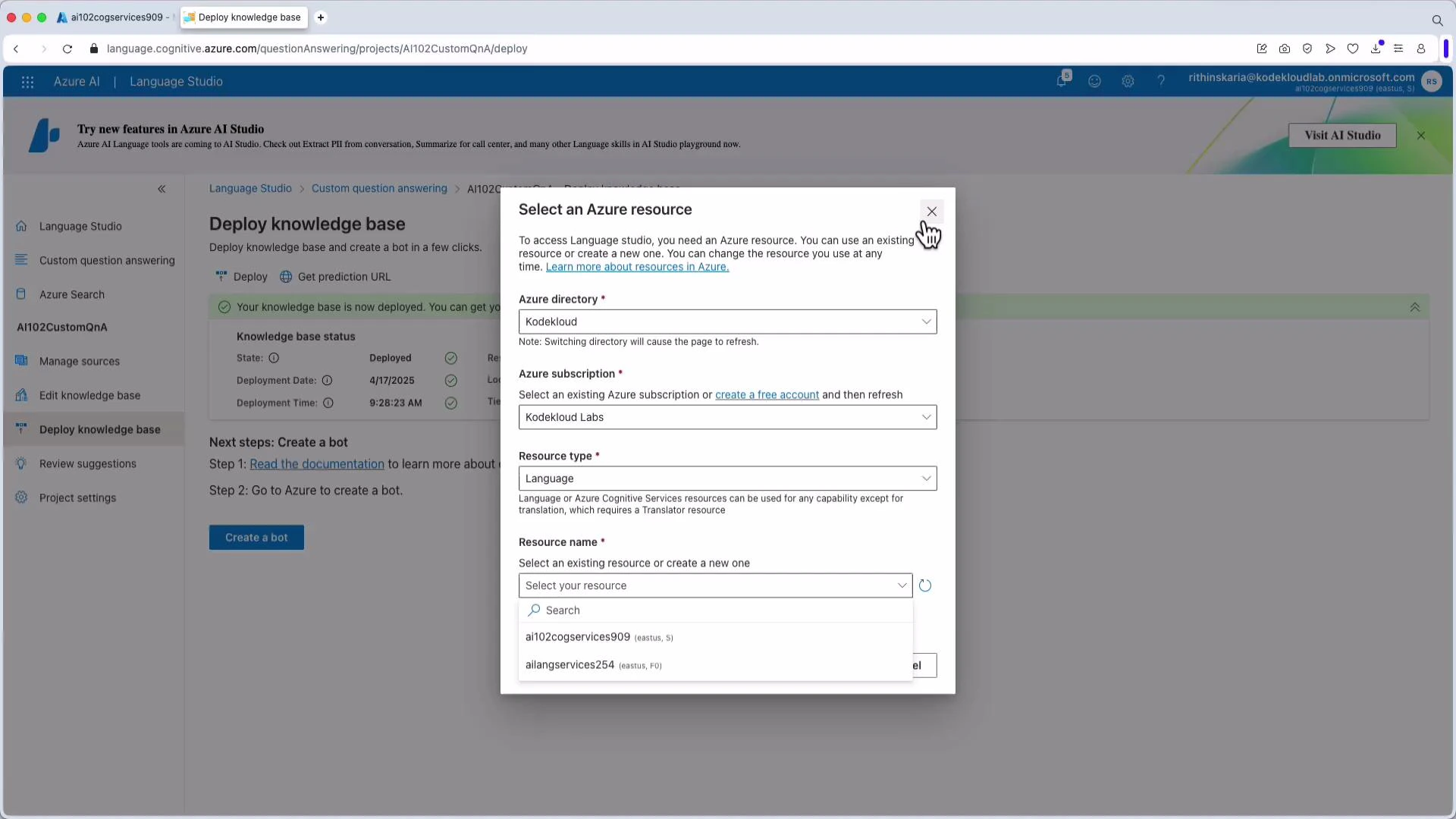 A screenshot of Azure Language Studio on a "Deploy knowledge base" page with a modal dialog titled "Select an Azure resource." The dialog shows fields to choose an Azure directory, subscription, resource type, and resource name.
