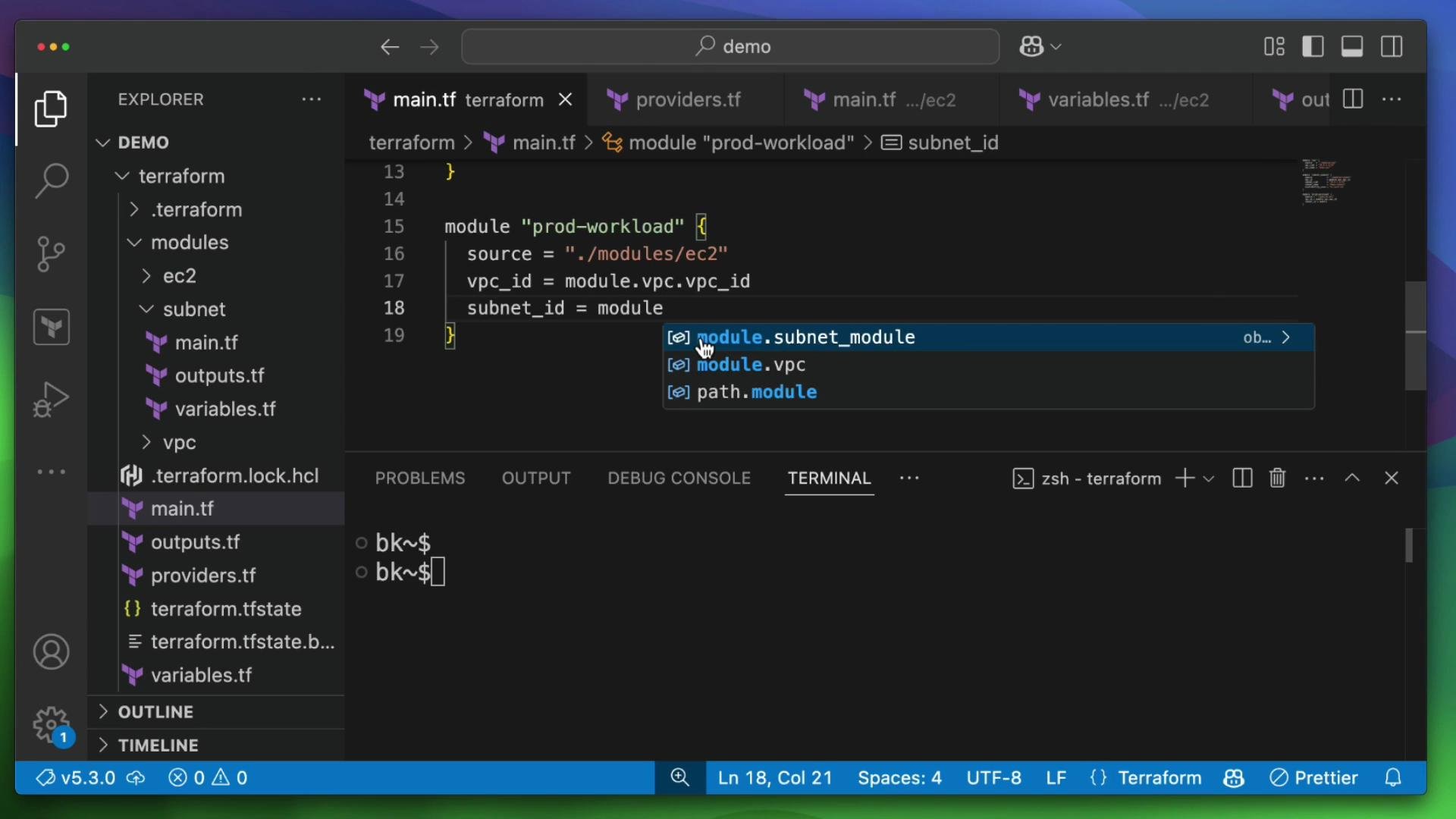 The image shows a Visual Studio Code window with a Terraform configuration file open, displaying code related to module configuration and variables for a cloud infrastructure setup. The left sidebar lists project files, while the main section includes code with autocompletion suggestions.