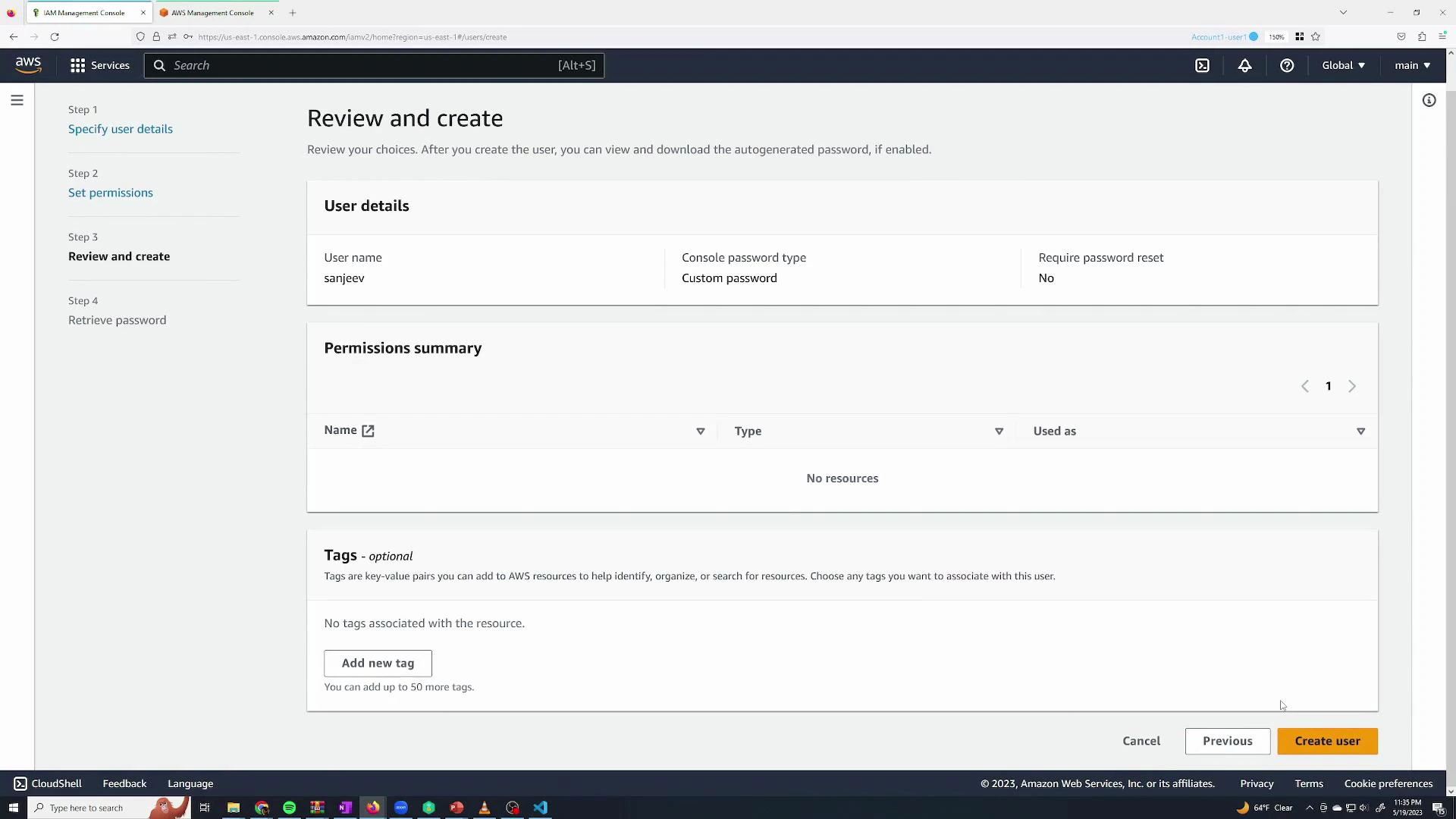 A screenshot of the AWS IAM console on the "Review and create" screen for creating a user named "sanjeev." It shows user details, an empty permissions summary, an optional tags section, and buttons to cancel, go back, or "Create user."