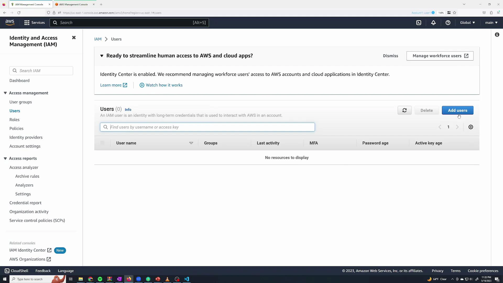 A screenshot of the AWS Identity and Access Management (IAM) console on the Users page showing no users listed. The interface shows options like "Add users," "Manage workforce users" (Identity Center), and navigation for user groups, roles, and policies.