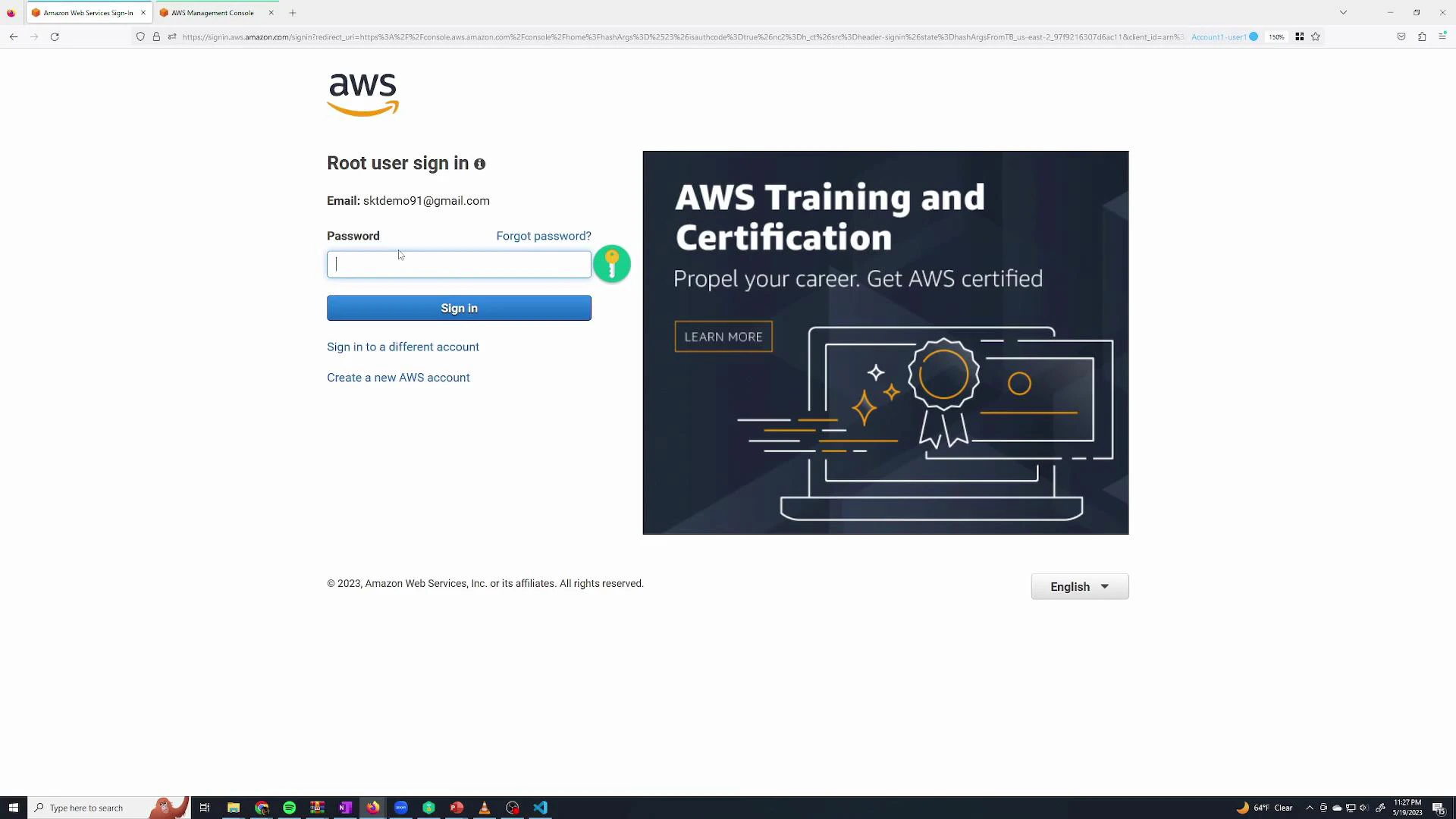 A screenshot of the AWS root user sign-in page showing an email address filled in, a password field and a "Sign in" button. The right side displays a large "AWS Training and Certification" advertisement.