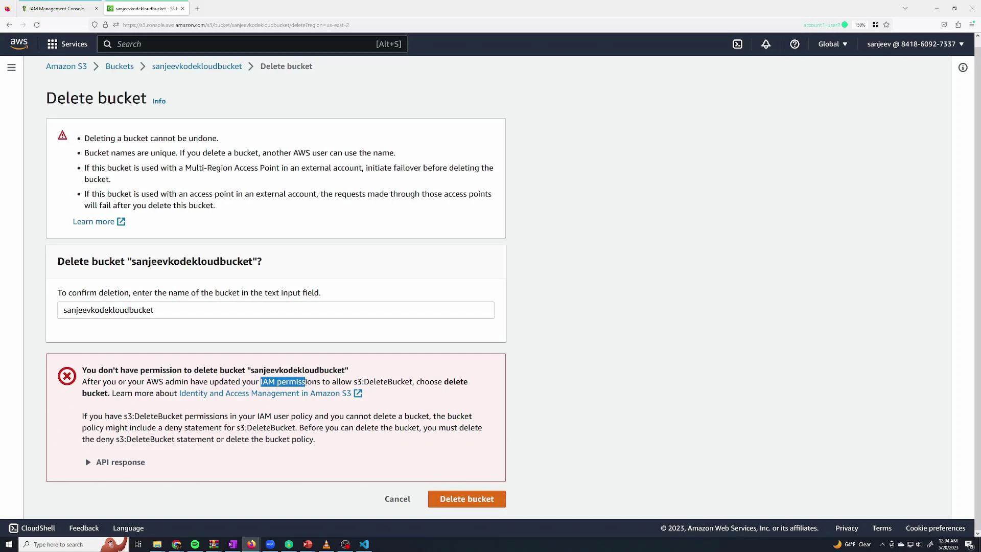 A screenshot of the AWS S3 console on the "Delete bucket" page showing a prompt to confirm deletion of the bucket "sanjeevkodekloudbucket" and a red error message saying the user lacks permission to delete it. The page includes instructions about IAM permissions, a text input to enter the bucket name, and "Cancel" and "Delete bucket" buttons.