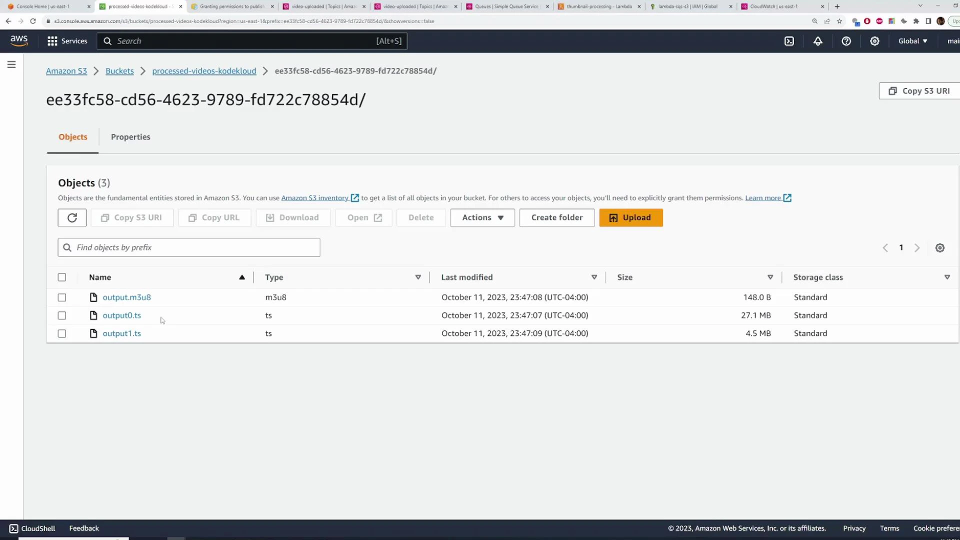 A screenshot of the Amazon S3 web console showing a bucket folder with three objects: output.m3u8 and two .ts video segment files, along with their sizes and last-modified timestamps.