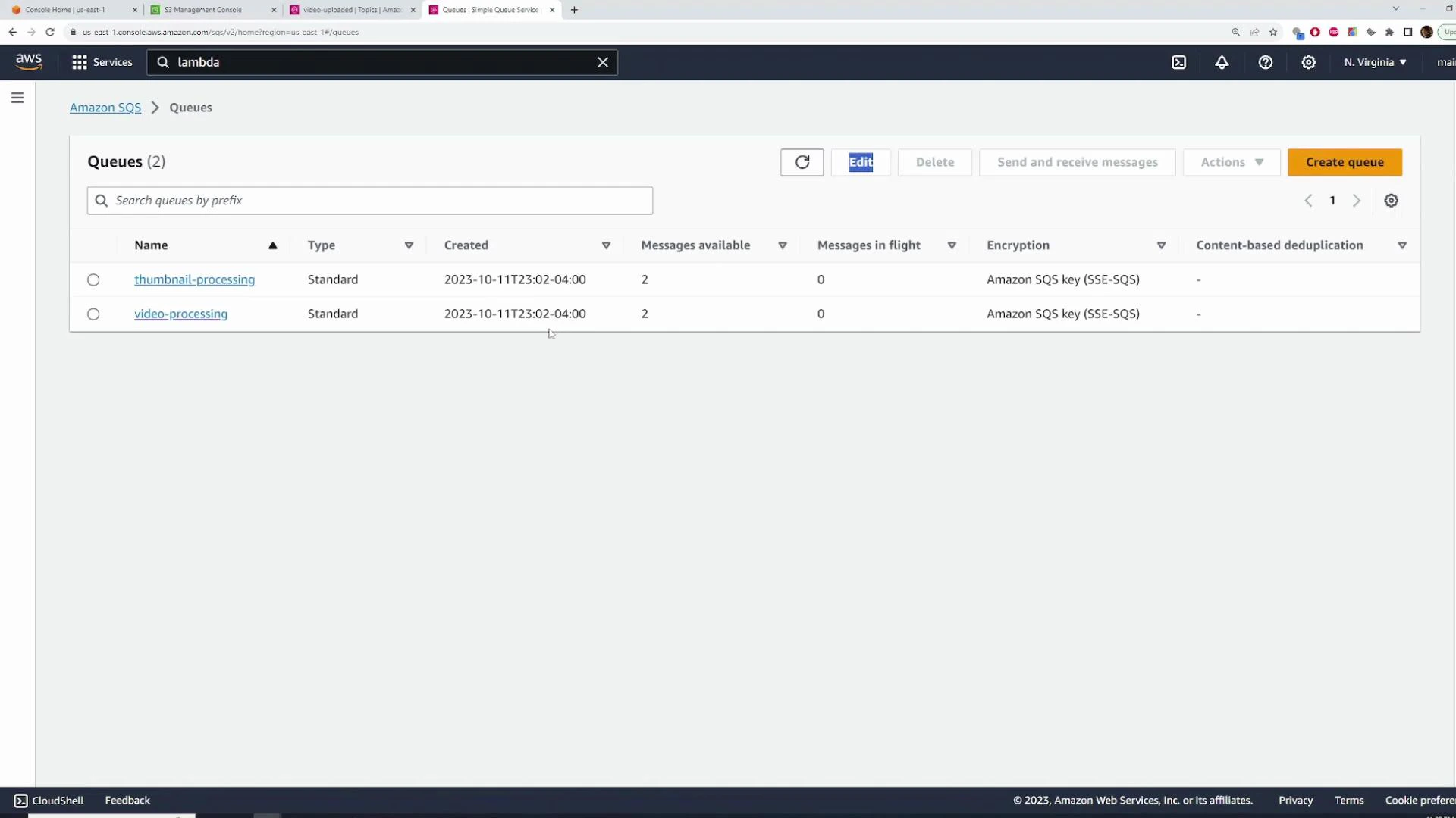 A screenshot of the Amazon SQS console showing two queues named "thumbnail-processing" and "video-processing." Each queue is of type Standard, created on 2023-10-11, with 2 messages available and 0 messages in flight.