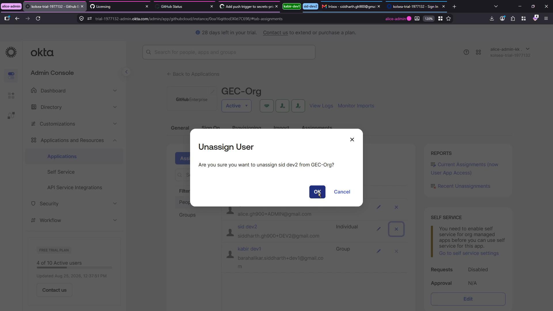A screenshot of the Okta Admin Console with a confirmation dialog asking to unassign a user from an organization/app. The modal shows "OK" and "Cancel" buttons over the applications/assignments page.