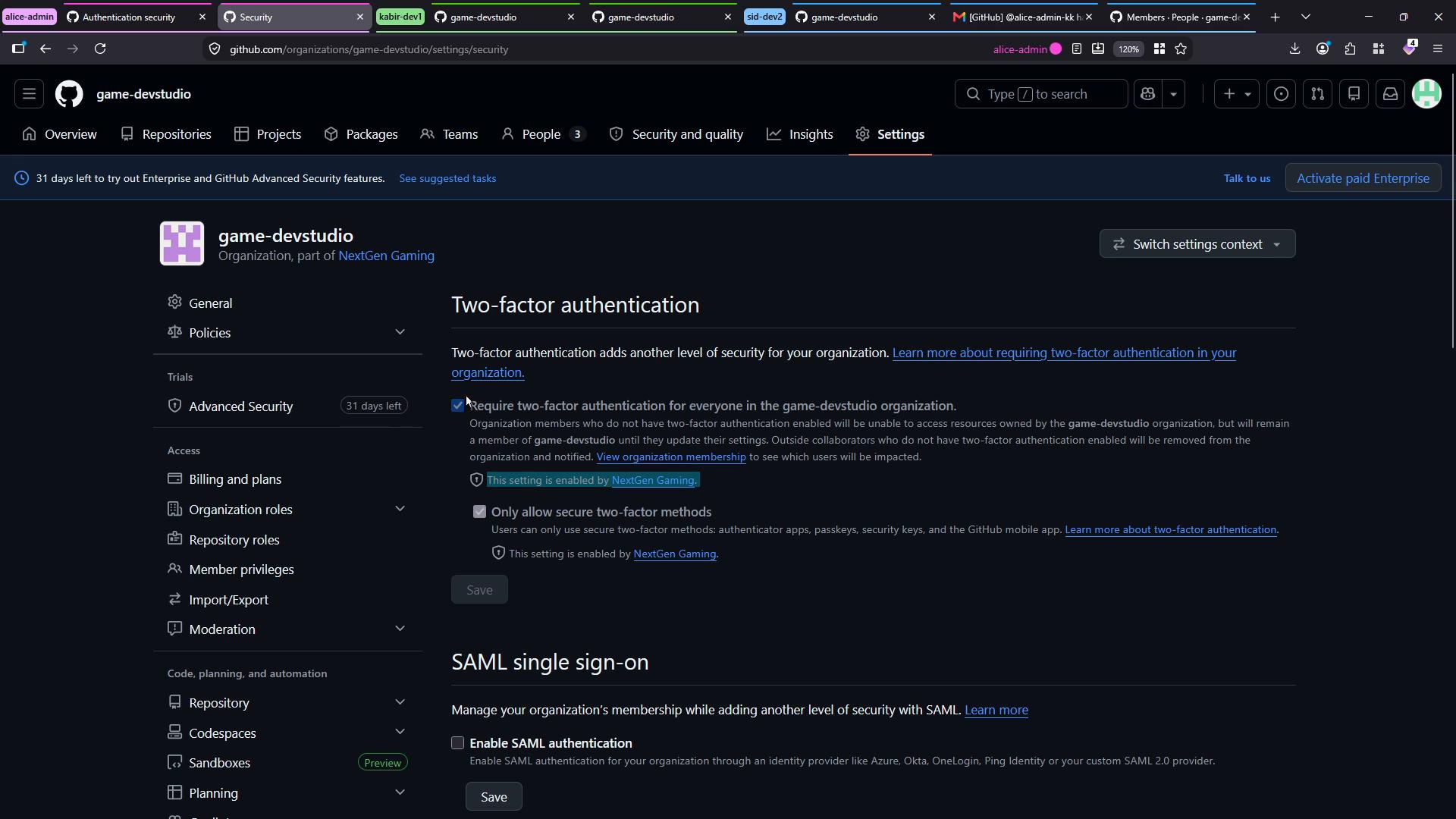 A dark-themed GitHub organization settings page for "game-devstudio," showing security options. The Two-factor authentication and SAML single sign-on settings are displayed, with two-factor required by the org.