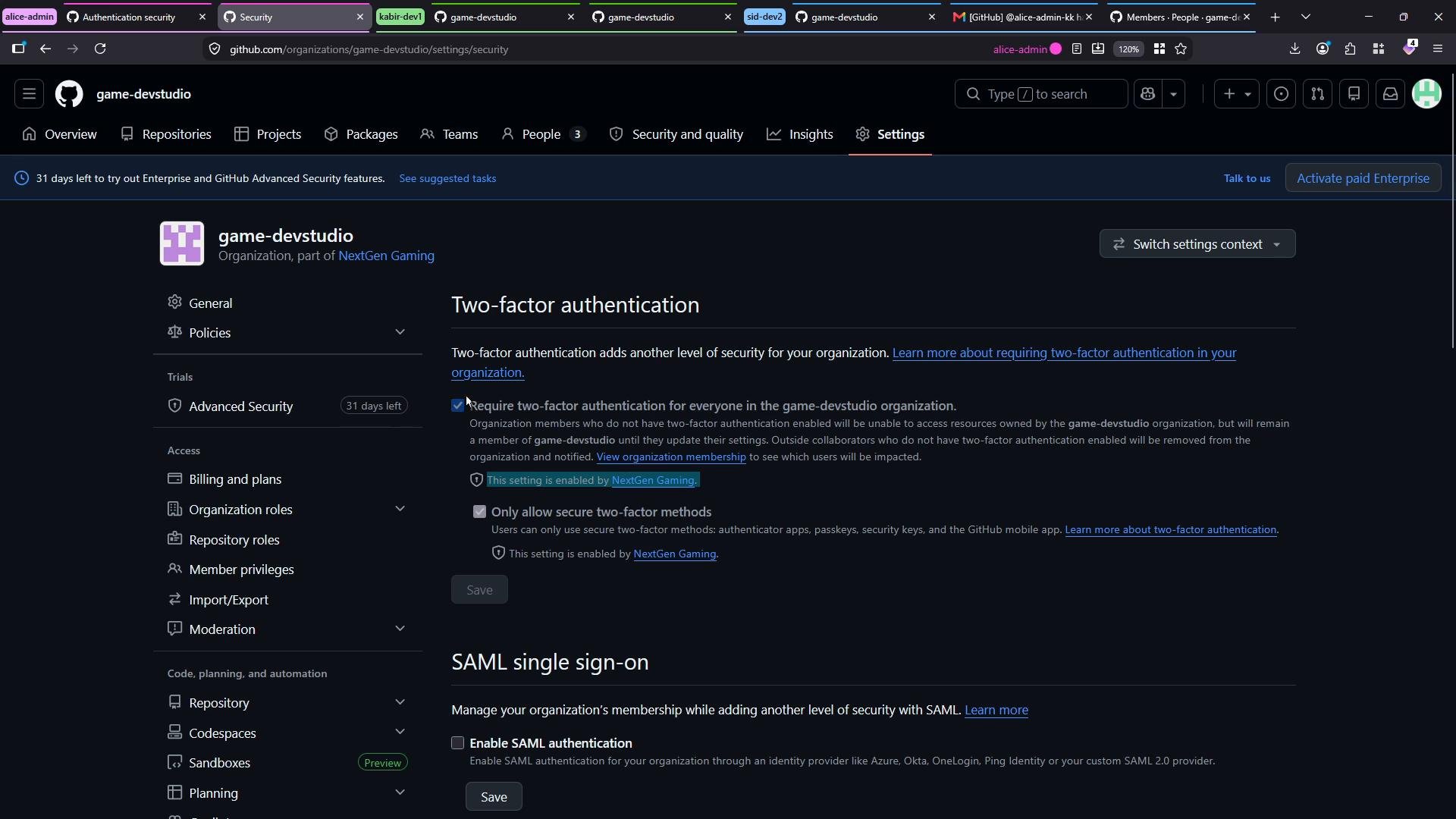 A dark-themed GitHub organization settings page for "game-devstudio," showing security options. The Two-factor authentication and SAML single sign-on settings are displayed, with two-factor required by the org.
