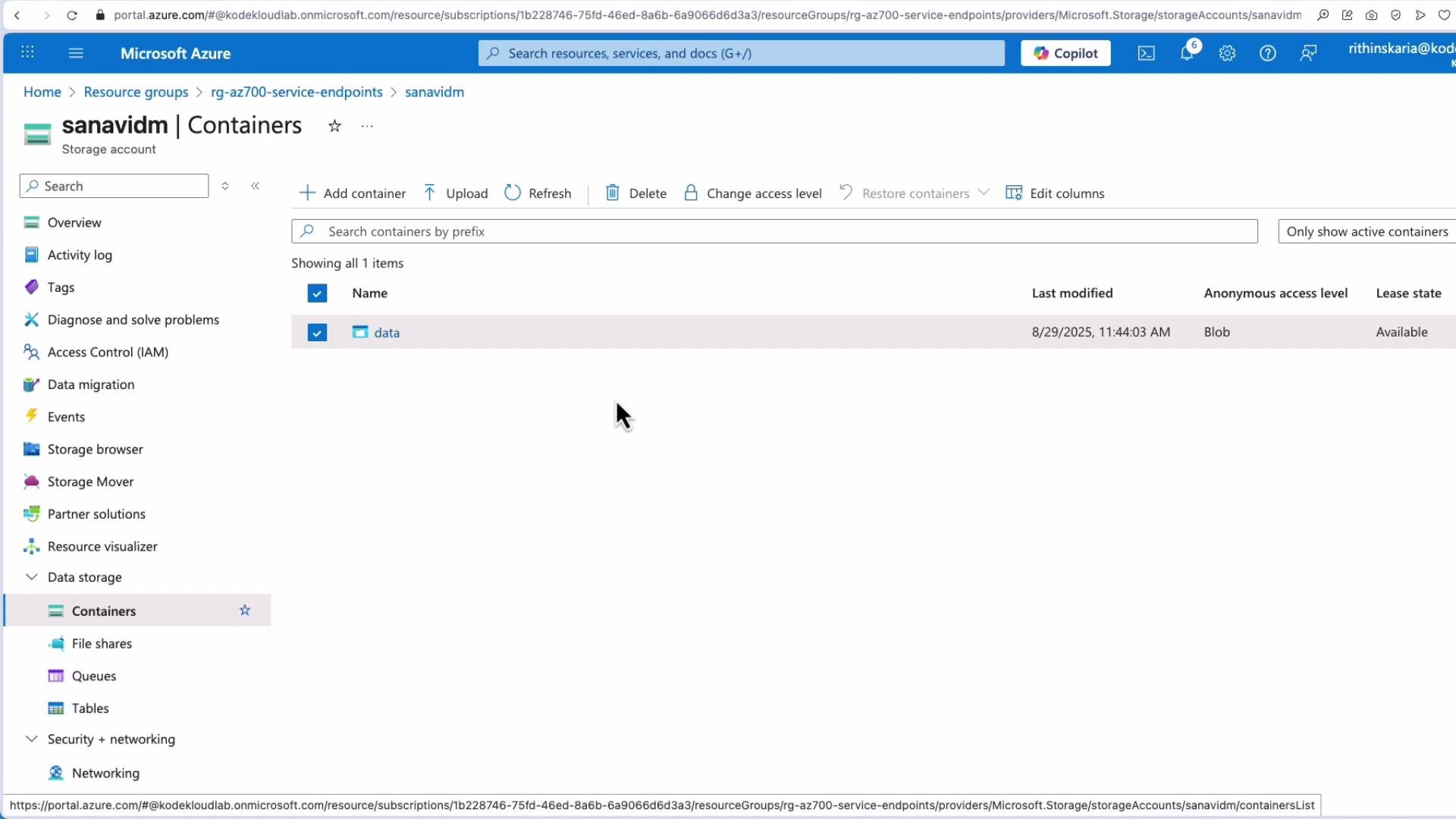 The image shows a Microsoft Azure portal interface displaying a storage account with one container named "data," which has a Blob access level and is available.