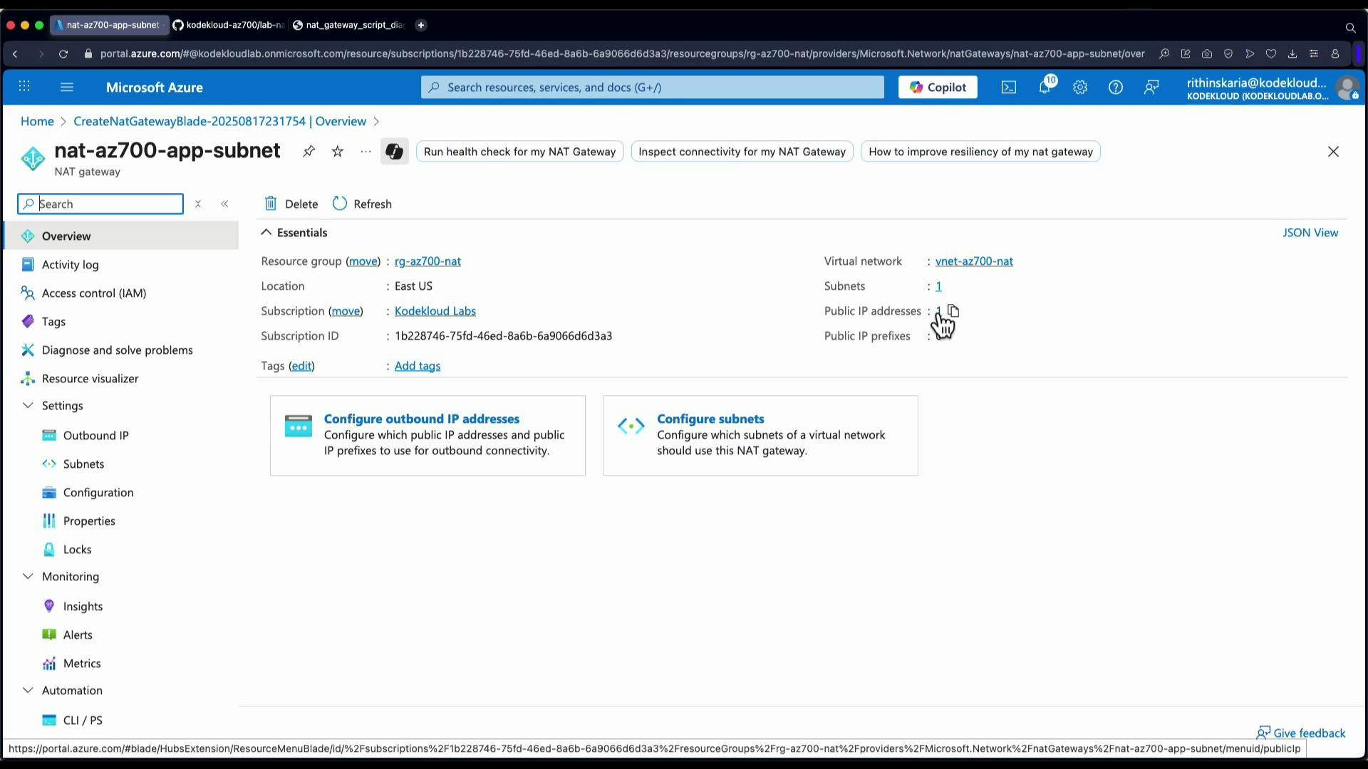 A screenshot of the Microsoft Azure portal showing the overview page for a NAT gateway named "nat-az700-app-subnet." The Essentials panel lists the resource group, location (East US), virtual network and counts for subnets/public IPs, with tiles to configure outbound IP addresses and subnets.