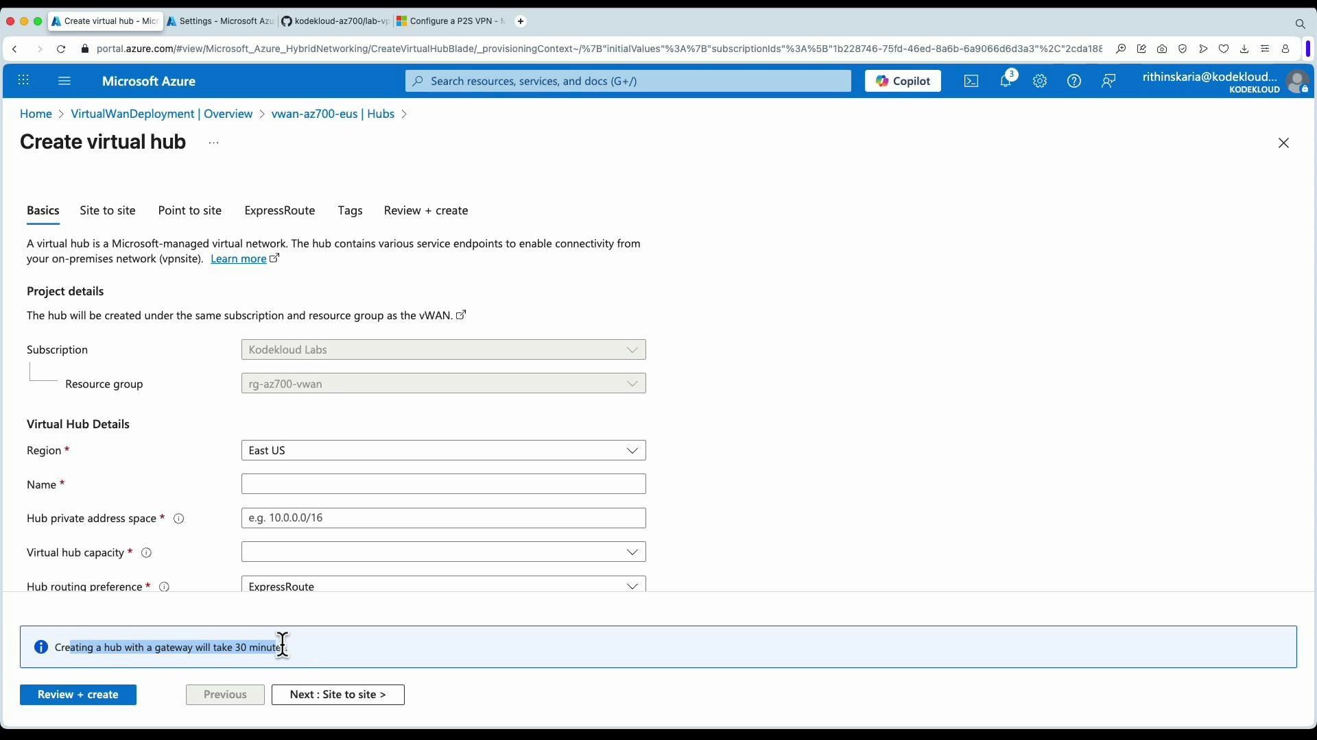 Screenshot of the Microsoft Azure portal showing the "Create virtual hub" setup page. The form displays fields for subscription, resource group, region, name, hub private address space and routing preferences, with "Review + create" and navigation buttons at the bottom.