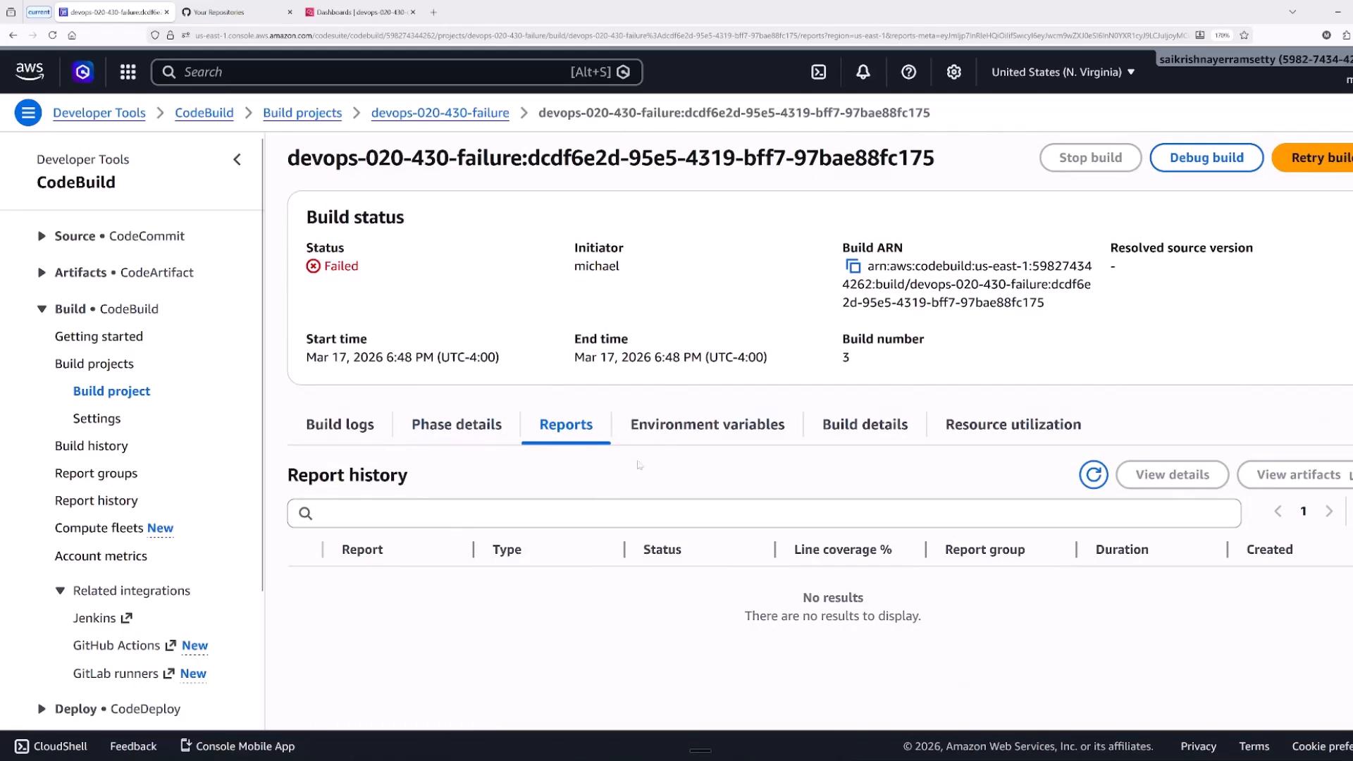 A screenshot of the AWS CodeBuild console showing the build project "devops-020-430-failure" with a red "Failed" status and details like the initiator, start/end times, and Build ARN. The Reports tab is selected and shows no report results.