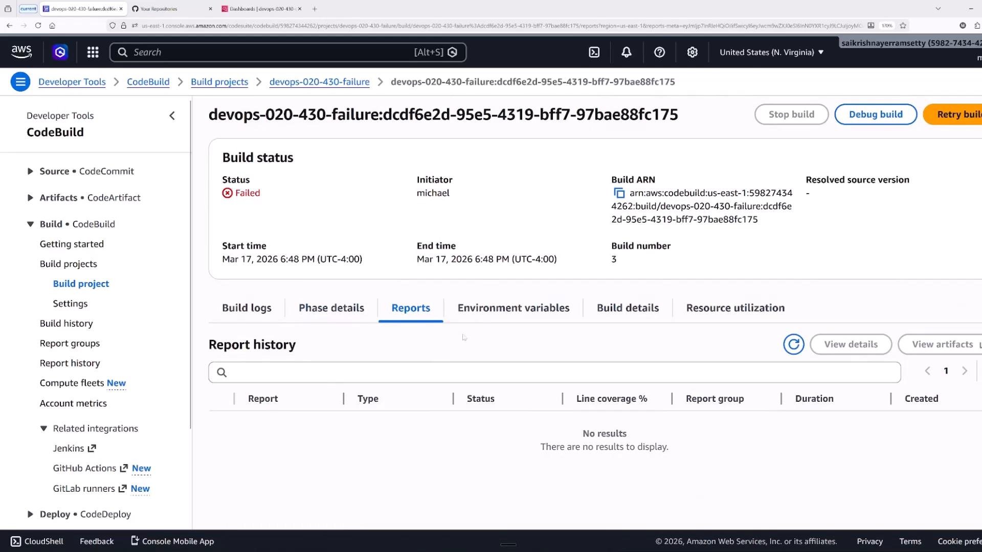 A screenshot of the AWS CodeBuild console showing the build project "devops-020-430-failure" with a red "Failed" status and details like the initiator, start/end times, and Build ARN. The Reports tab is selected and shows no report results.