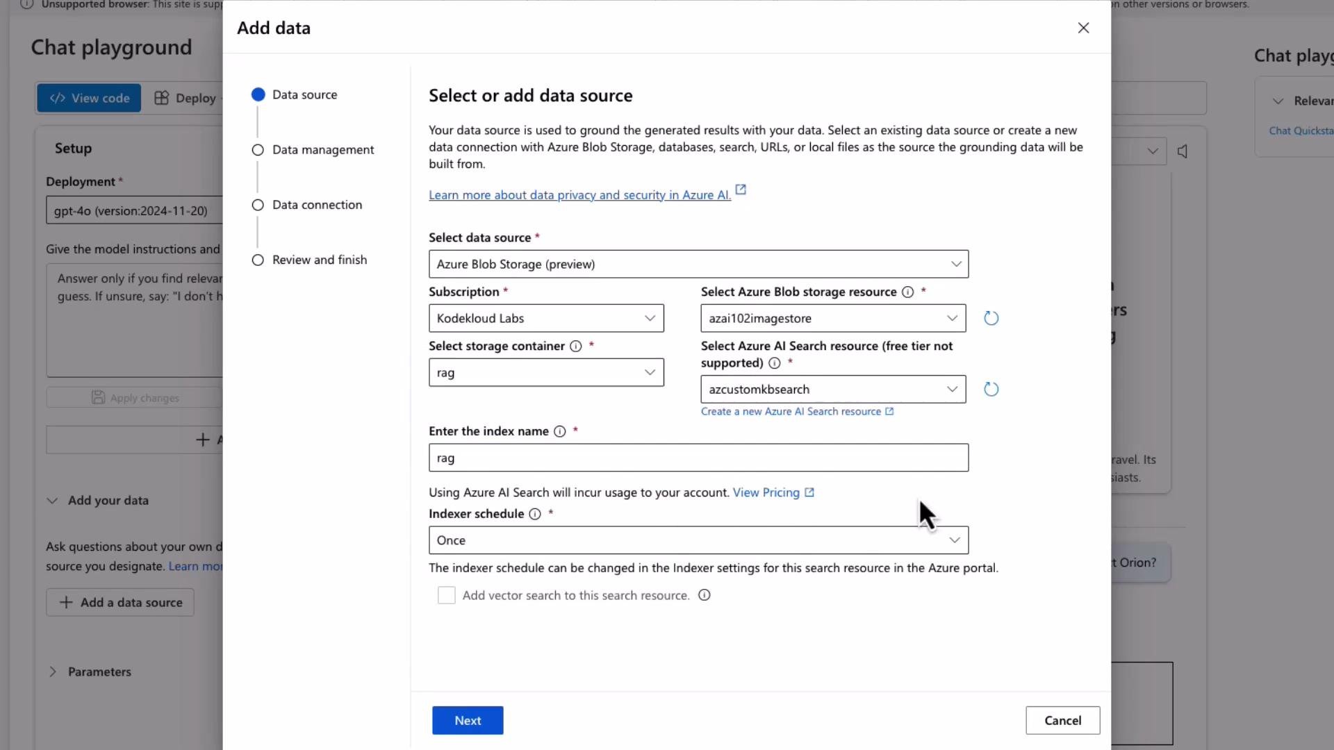 A screenshot of an "Add data" dialog in Azure AI where the user selects an Azure Blob Storage data source, subscription, storage container, Azure AI Search resource, index name, and indexer schedule. The dialog overlays a "Chat playground" interface in the background.