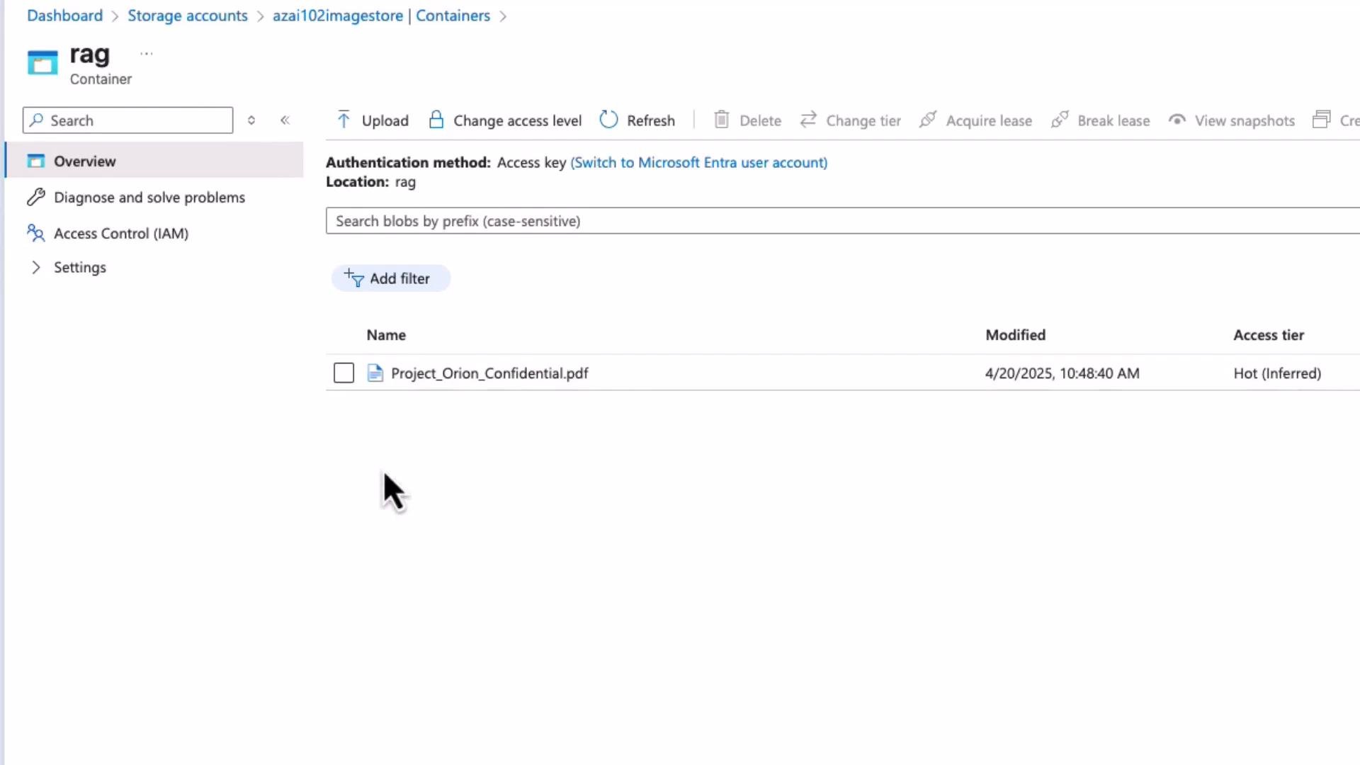 A screenshot of an Azure Storage container named "rag" showing one blob file, "Project_Orion_Confidential.pdf," with a modified date of 4/20/2025 and access tier "Hot (Inferred)." The left pane shows container navigation options like Overview, Diagnose and solve problems, Access Control (IAM), and Settings.