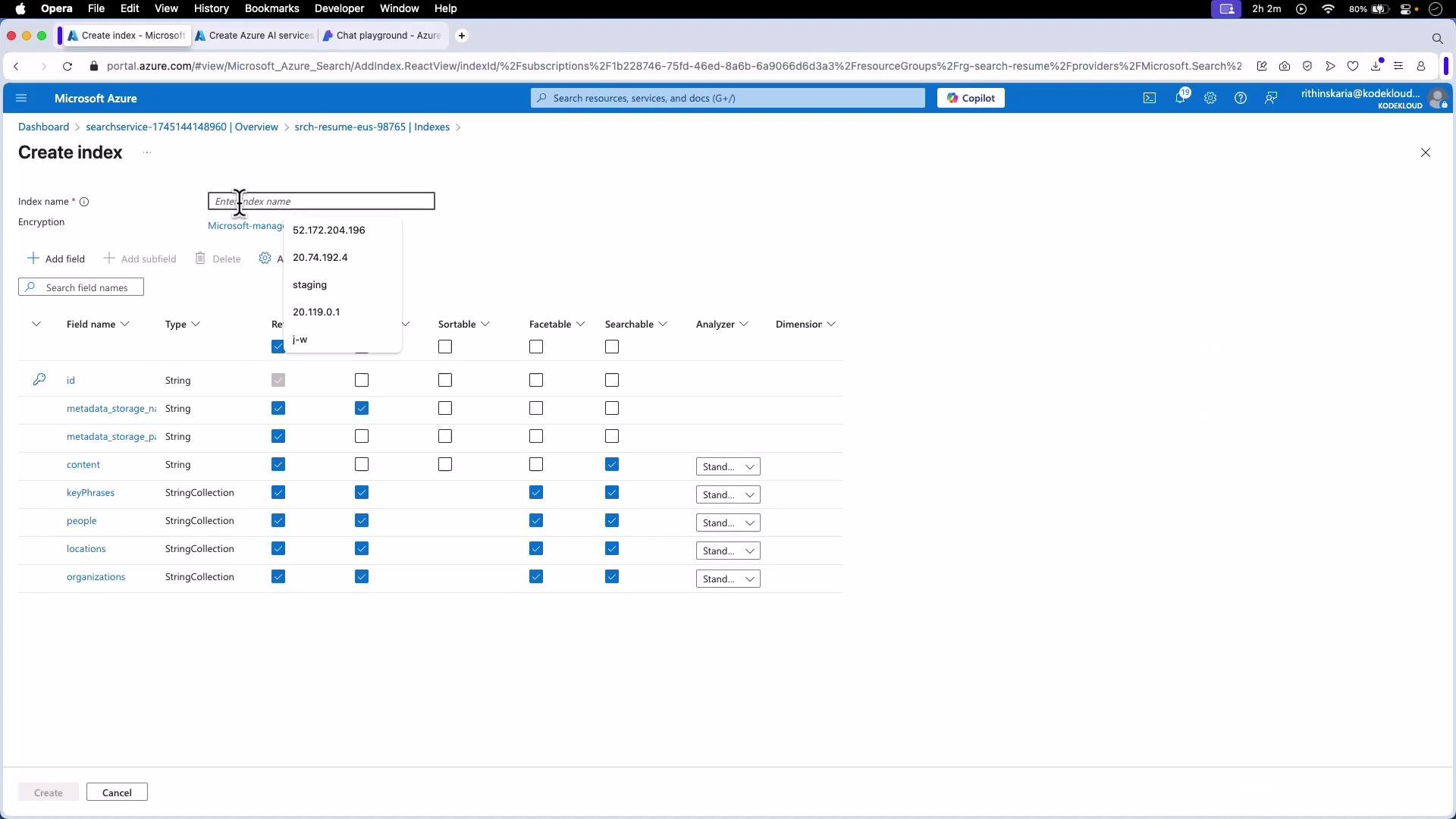 A screenshot of the Microsoft Azure portal on a Mac showing the "Create index" page. It displays an index name input and a table of fields (id, metadata_storage_name, content, keyPhrases, people, locations, organizations) with checkboxes for properties like retrievable, searchable, and facetable.
