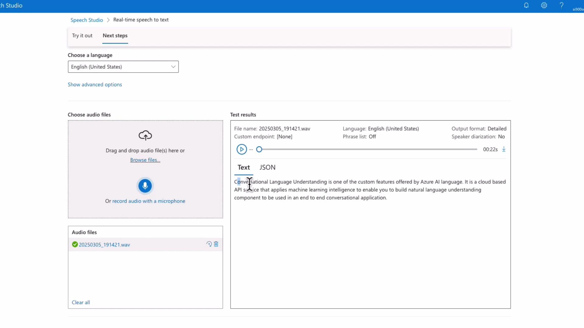 A screenshot of Microsoft Azure Speech Studio's real-time speech-to-text interface. It shows options to choose language and upload or record audio on the left, and a test results pane on the right with a transcribed JSON output and an uploaded .wav file.