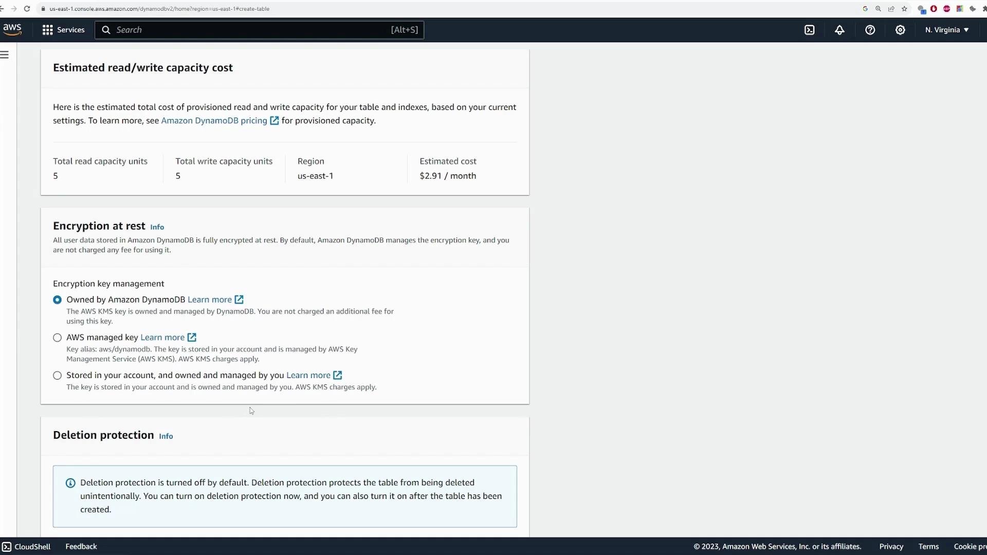 A screenshot of the AWS DynamoDB console showing "Estimated read/write capacity cost" (Total read and write capacity units: 5 each, estimated $2.91/month). Below it are "Encryption at rest" options (selected: Owned by Amazon DynamoDB) and a panel about deletion protection.