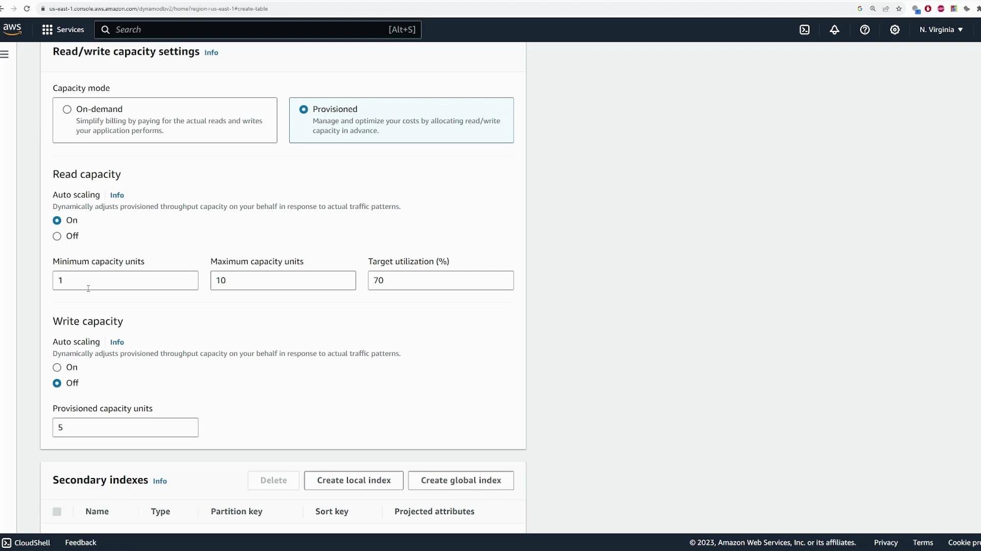 A screenshot of the AWS DynamoDB "Read/write capacity settings" console with Capacity mode set to Provisioned. Read auto-scaling is On (min 1, max 10, target 70%) and write auto-scaling is Off with provisioned write capacity 5.