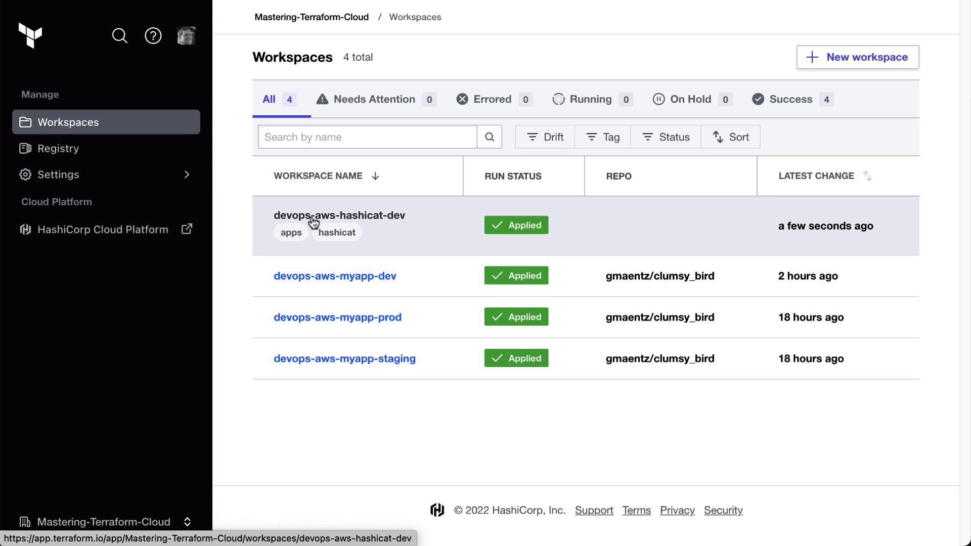 A screenshot of the HashiCorp Terraform Cloud "Workspaces" page listing four workspaces (devops-aws-hashicat-dev and three devops-aws-myapp environments). Each workspace shows a green "Applied" run status, repo names, and recent change timestamps.