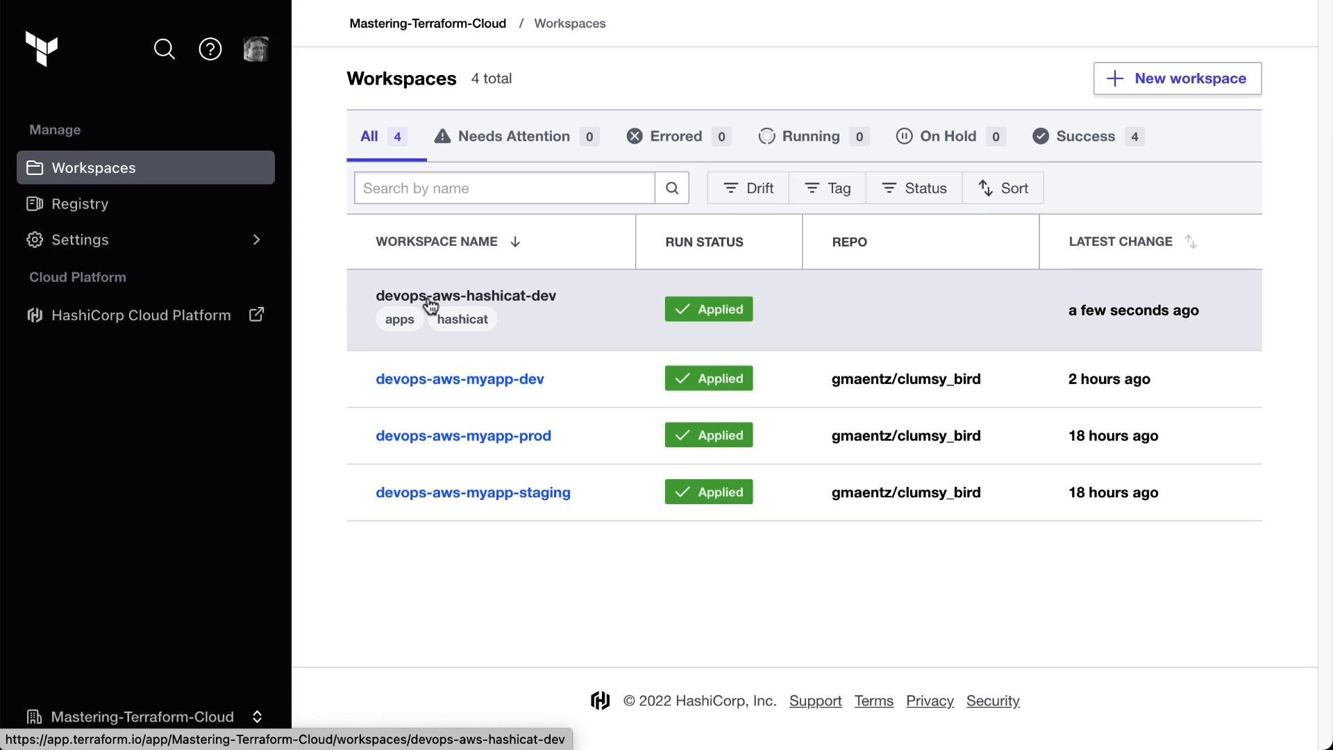 A screenshot of the HashiCorp Terraform Cloud "Workspaces" page listing four workspaces (devops-aws-hashicat-dev and three devops-aws-myapp environments). Each workspace shows a green "Applied" run status, repo names, and recent change timestamps.